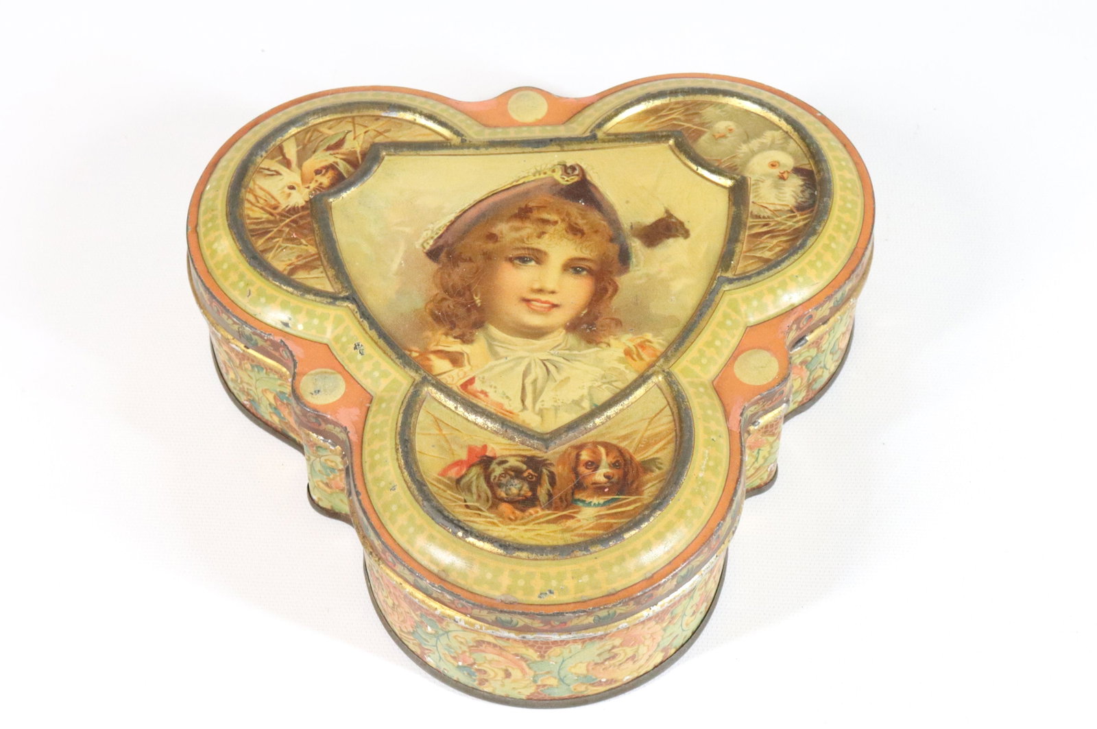 SWALLOW & ARIELL TIN LITHO BISCUIT TIN: HINGED LID. DEPICTING YOUNG LADY WITH ANIMALS. CA. 1900 2 1/4" X 8 1/4"