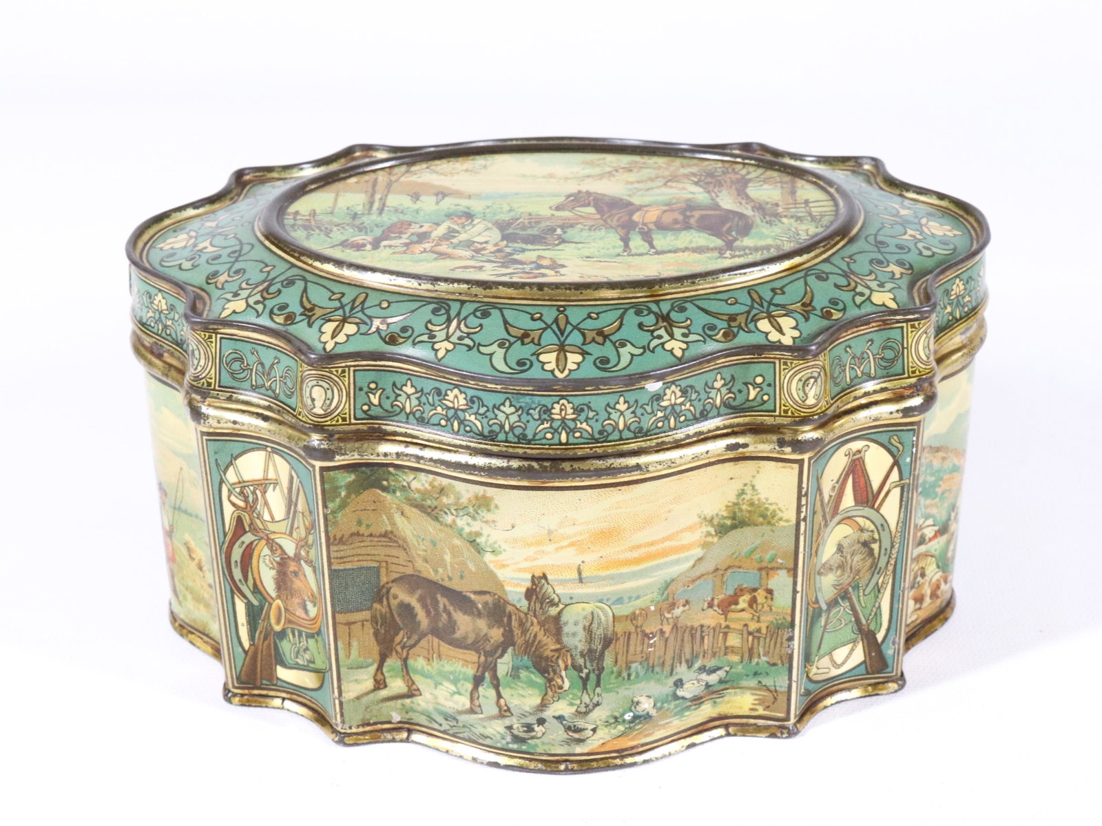 HUNTLEY & PALMERS TIN LITHO BISCUIT TIN: SPORTING WITH DOGS/GUNS/HORSES CA. 1889 3 3/4" X 7 1/4" X 5 1/2"