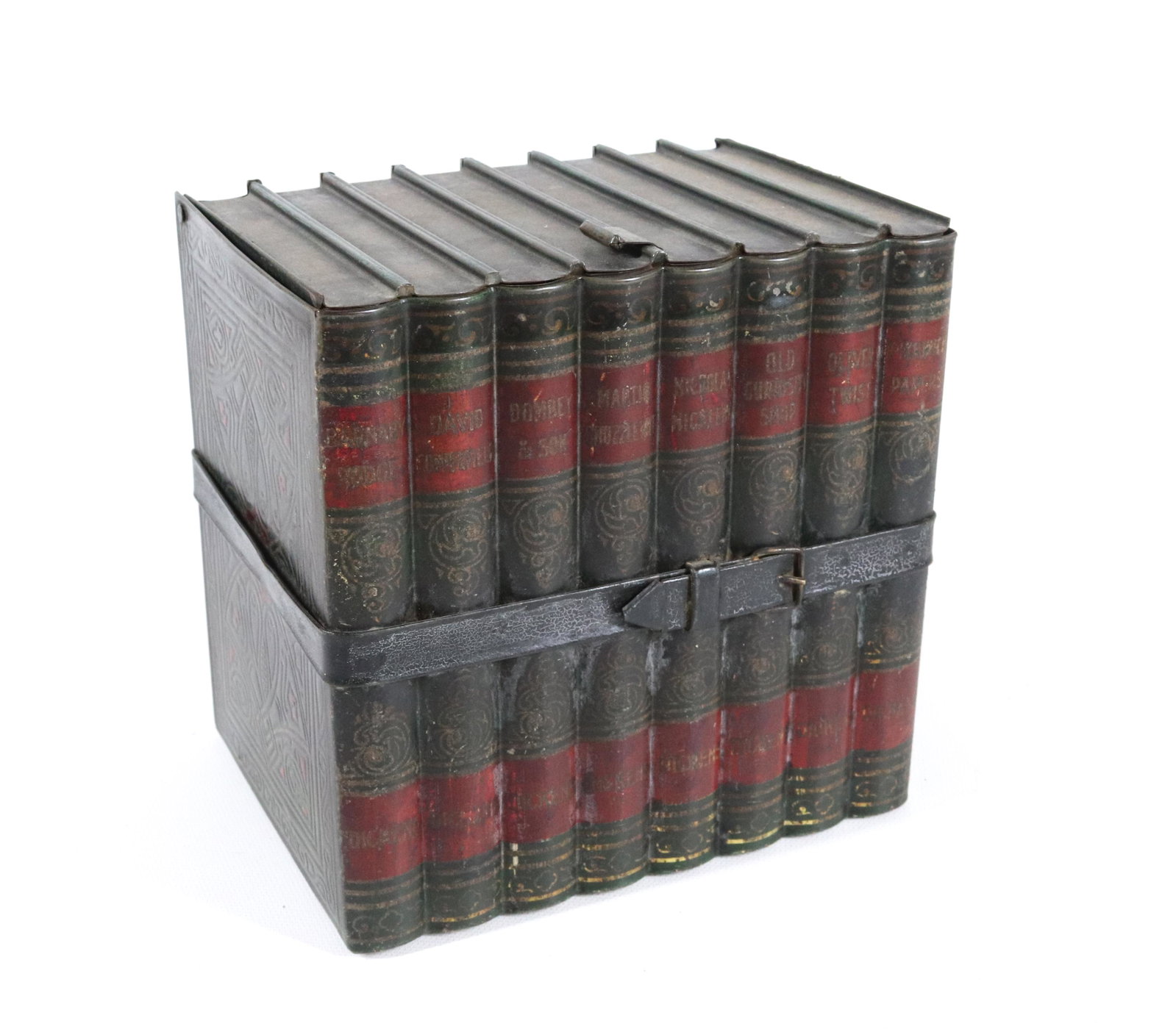 HUNTLEY & PALMERS TIN LITHO BISCUIT TIN: DICKENS BOOKS WITH FAUX LEATHER STRAP. CA. 1911 6 1/4" X 6 1/2" X 4 3/4"