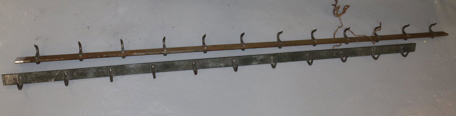 TWO IRON WALL MEAT HOOKS (1 of 2)