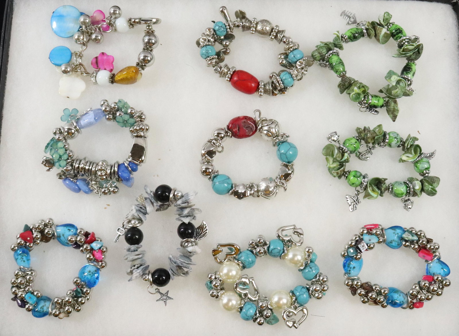 LOT OF COSTUME JEWELRY BRACELETS: (10) EXPANDABLE BRACELETS Terms: Hartzell's Auction Gallery will handle most of the shipping in-house. WE do reserve the right to not ship some large items, larger lots of glassware, Furniture, or oth