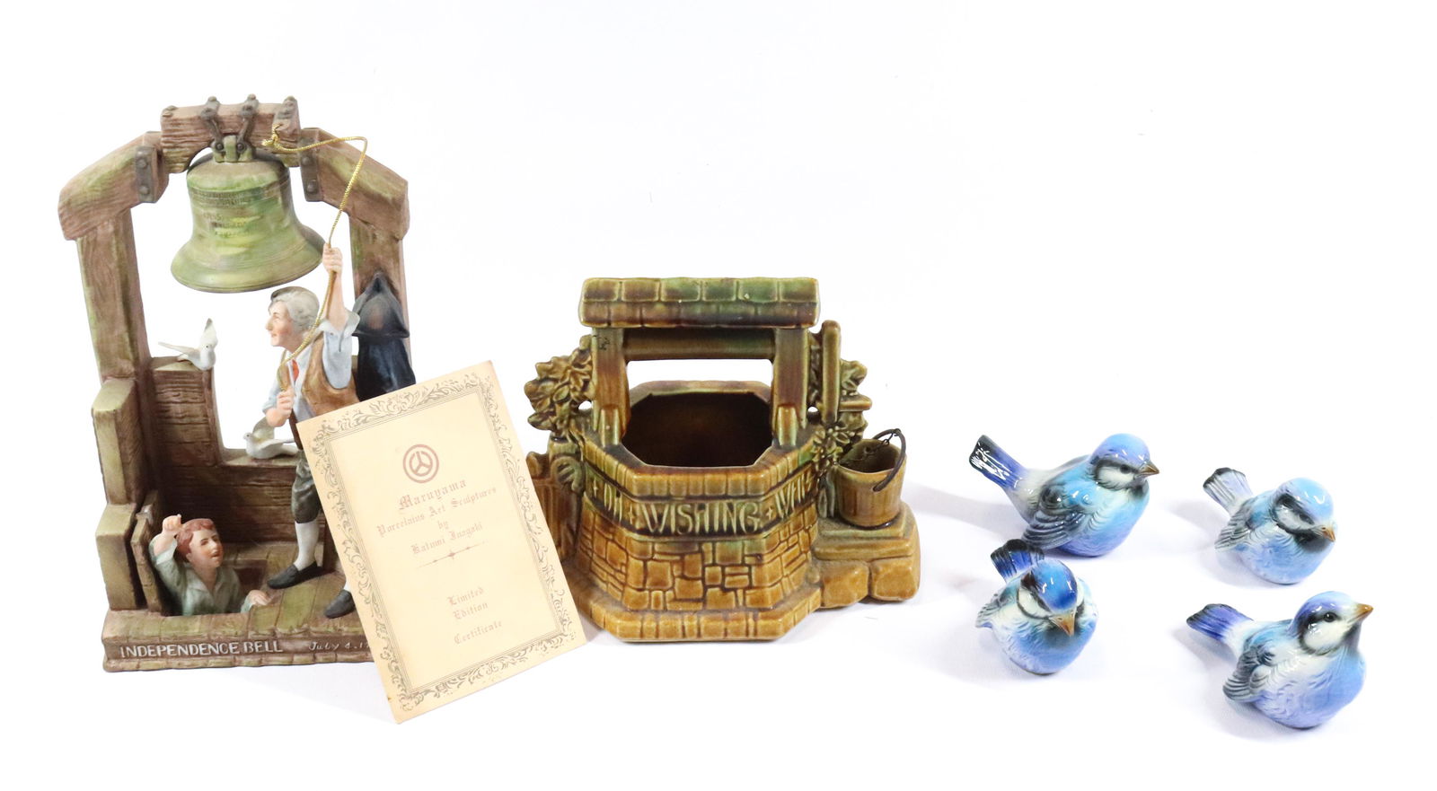 GOEBEL BIRDS, MCCOY WELL AND INDEPENDENCE BELL: FOUR BIRDS, WISHING WELL AND KATUMI INAGAKI LIMITED EDITION SCULPTURE Dimensions: WISHING WELL 6 3/4" H Terms: Hartzell's Auction Gallery will handle most of the shipping in-house. WE do reserve the r