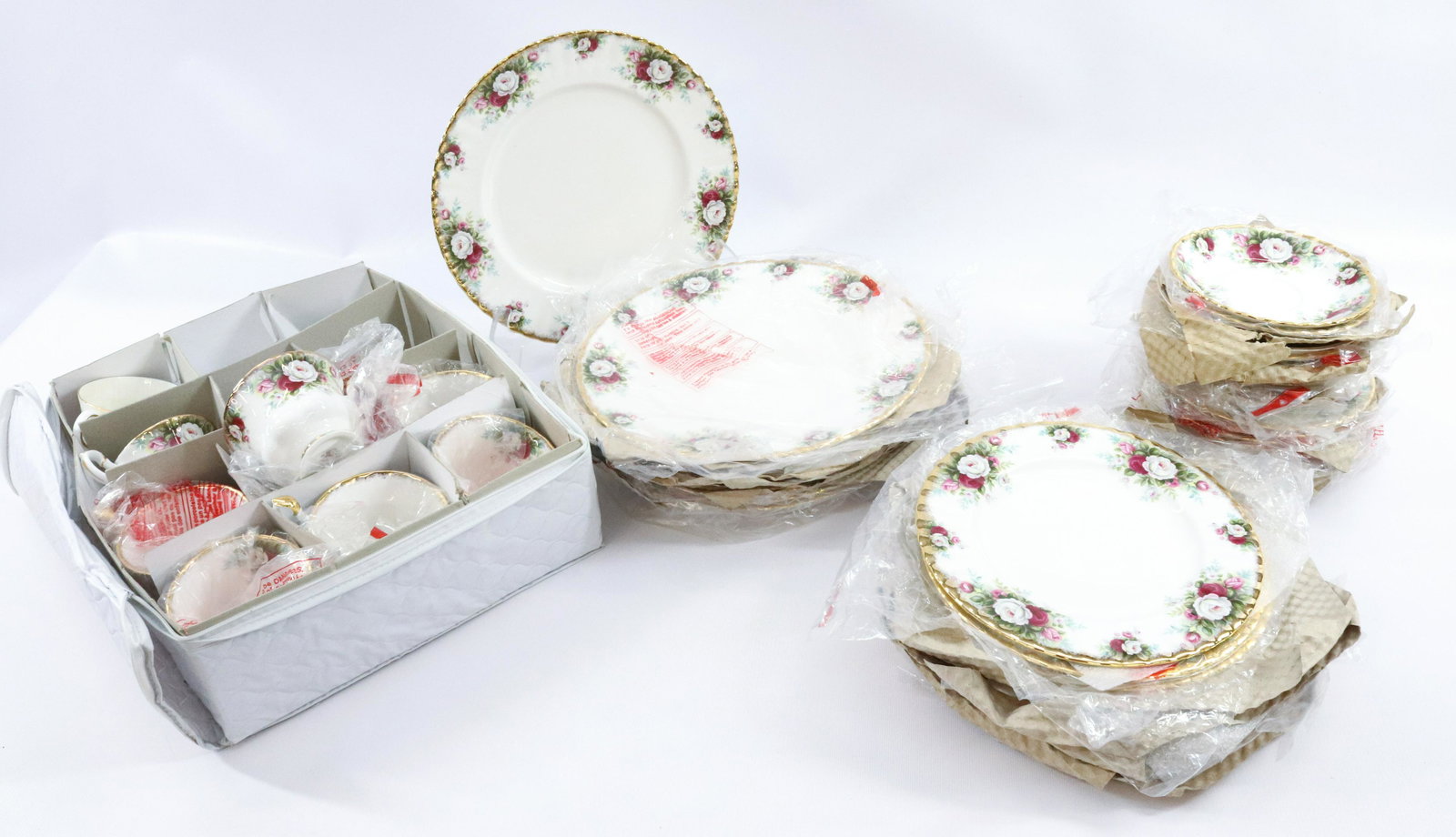 LARGE SET OF ROYAL ALBERT BONE CHINA: 8 DINNER PLATES, 8 SALAD PLATES, 8 BREAD AND BUTTERS AND 8 CUPS AND SAUCERS TERMS:Hartzell's Auction Gallery will handle most of the shipping in-house. WE do reserve the right to not ship some large i
