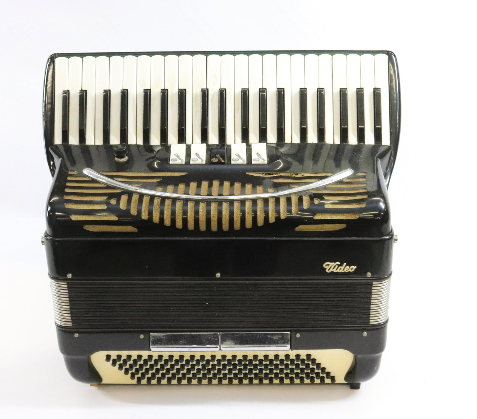 VIDEO ACCORDION: VIDEO 105 ACCORDION WITH CASE - SERIAL# 53096 DIMENSIONS: 20" X 18" X 9" TERMS: Hartzell's Auction Gallery will handle most of the shipping in-house. WE do reserve the right to not ship some large ite