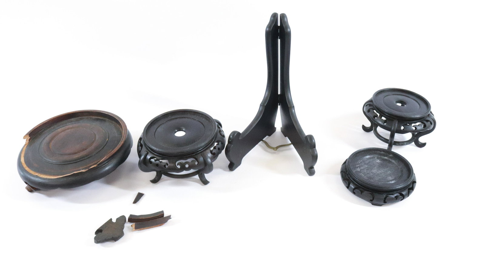 BOX OF STANDS: ASIAN AND MORE TERMS:Hartzell's Auction Gallery will handle most of the shipping in-house. WE do reserve the right to not ship some large items, larger lots of glassware, Furniture, or other items. Ho