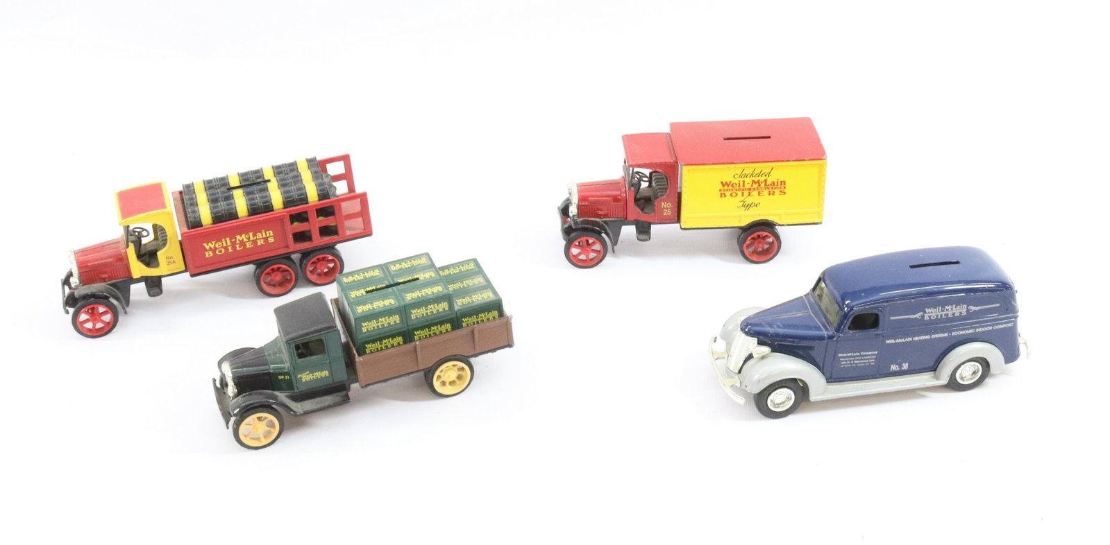 (4) COLLECTIBLE TRUCK BANKS: ALL ADVERTISE "WEIL-MCLAIN BOILERS" DIMENSIONS: LONGEST 8 1/4" TERMS: Hartzell's Auction Gallery will handle most of the shipping in-house. WE do reserve the right to not ship some large items, larger