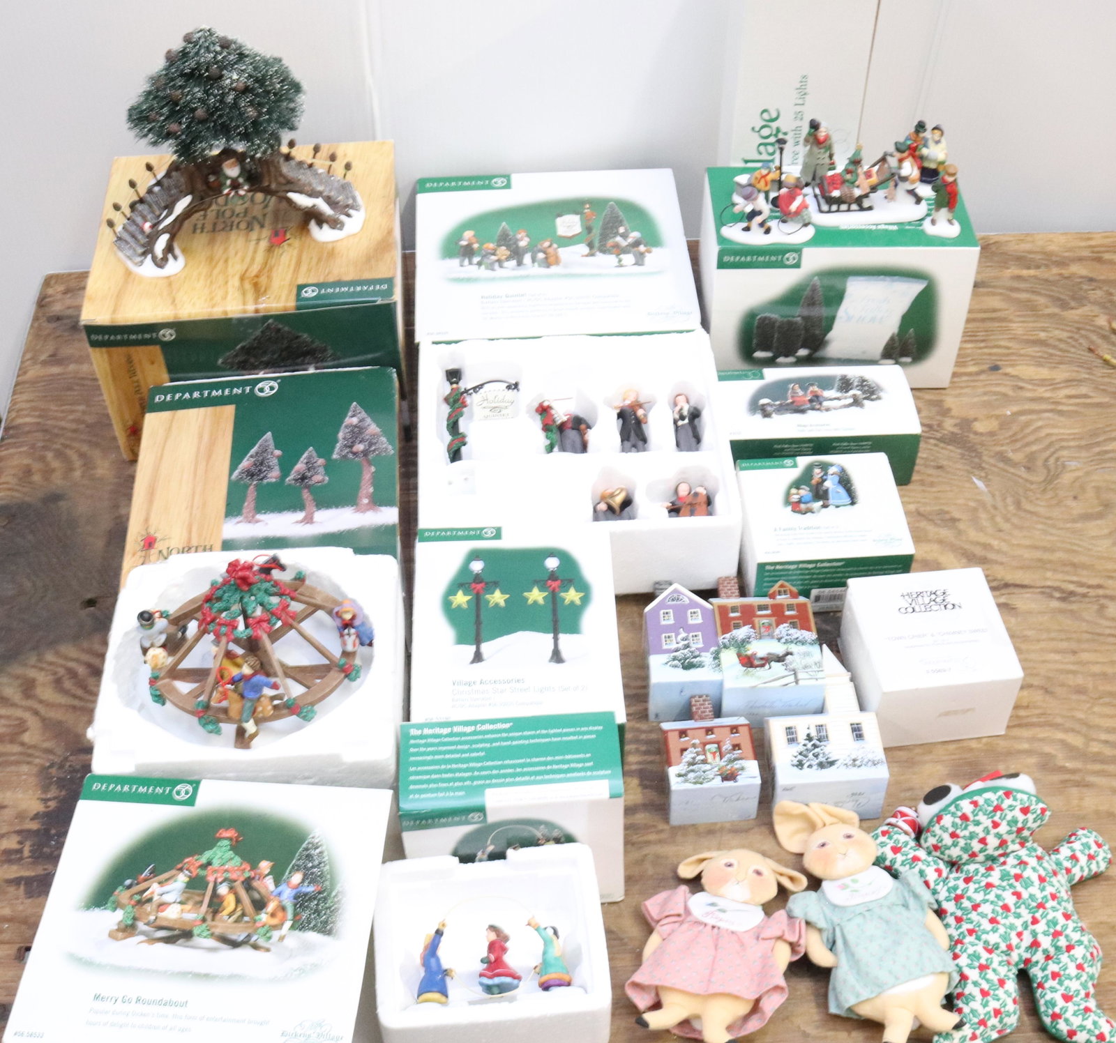 GROUP LOT OF DEPARTMENT 56 ITEMS: MOST IN ORIGINAL BOXES. PLUS, TWO PLUSH RABBITS AND A FROG TERMS: Hartzell's Auction Gallery will handle most of the shipping in-house. WE do reserve the right to not ship some large items, larger lot