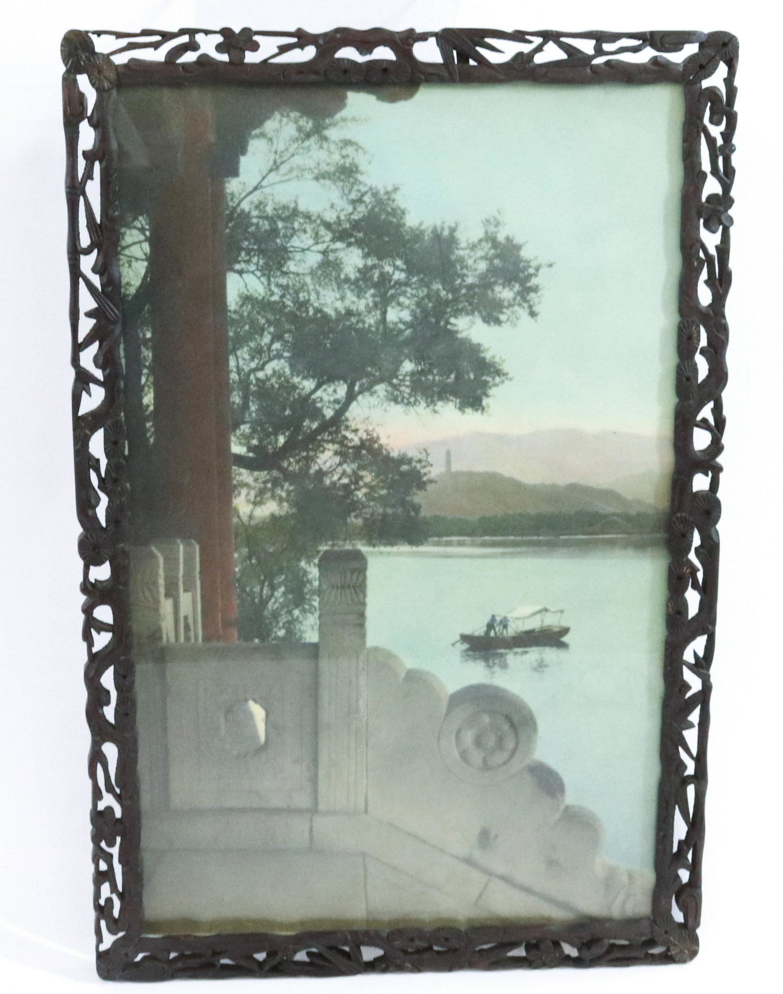 CHINESE HAND CARVED FRAME AND PHOTO: PHOTO BEIJING TEMPLE STEPS HAND COLORED. CARVED AND RETICULATED FRAME TEAK OR ROSEWOOD 1920S DIMENSIONS: 16 1/2" X 9 3/4" TERMS: Hartzell's Auction Gallery will handle most of the shipping in-house. W