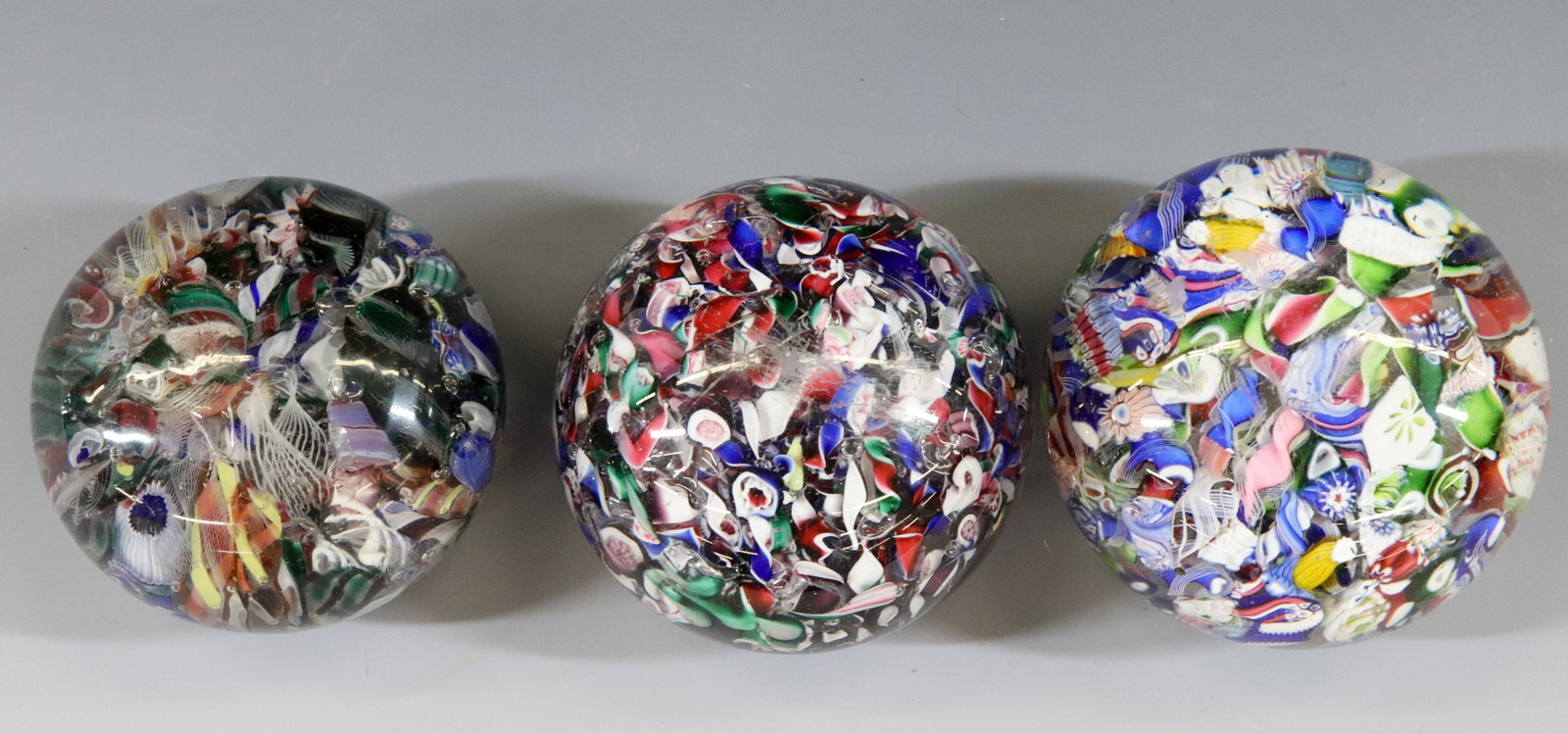 19TH CENTURY SCRAMBLED MILLEFIORI PAPERWEIGHTS: (3) WEIGHTS WITH INTRICATE CAINS AMERICAN OR FRENCH DIMENSIONS: 2 1/2" X 2 1/2" TERMS: Hartzell's Auction Gallery will handle most of the shipping in-house. WE do reserve the right to not ship some la