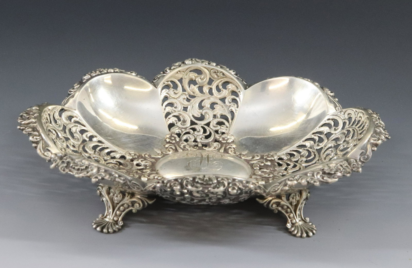 STERLING HAMILTON & DIESINGER BOWL: ORNATE AND RETICULATED PETIT FOURS BOWL WITH MONOGRAM TOTAL WEIGHT 5.55 OZT TERMS: Hartzell's Auction Gallery will handle most of the shipping in-house. WE do reserve the right to not ship some large 