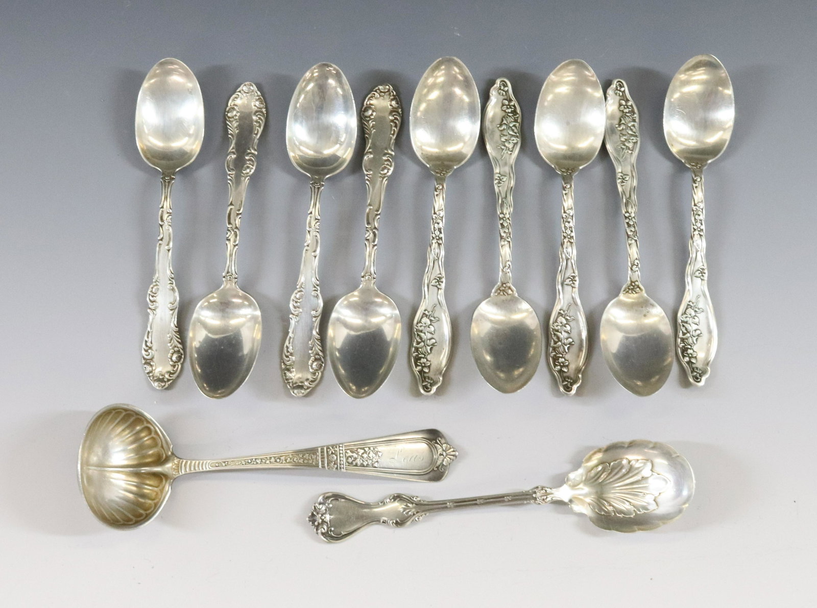 STERLING SILVER VICTORIAN FLATWARE: (11) INCLUDES 9 TEASPOONS SUGAR SHELL AND LADLE TOTAL WEIGHT 7.36OZT DIMENSIONS: 5 1/2"L APPROX TERMS: Hartzell's Auction Gallery will handle most of the shipping in-house. WE do reserve the right to 