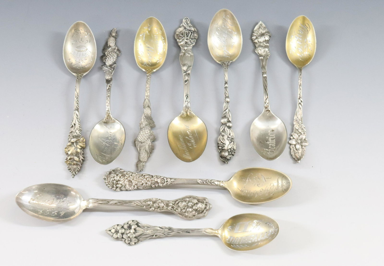 STERLING SILVER VICTORIAN SOUVENIR SPOONS: (10) ORNATE SOUVENIR SPOONS INCLUDES EASTER, PALM BEACH, GETTYSBURG ETC TOTAL WEIGHT 7.24 DIMENSIONS: 6"L TERMS: Hartzell's Auction Gallery will handle most of the shipping in-house. WE do reserve the