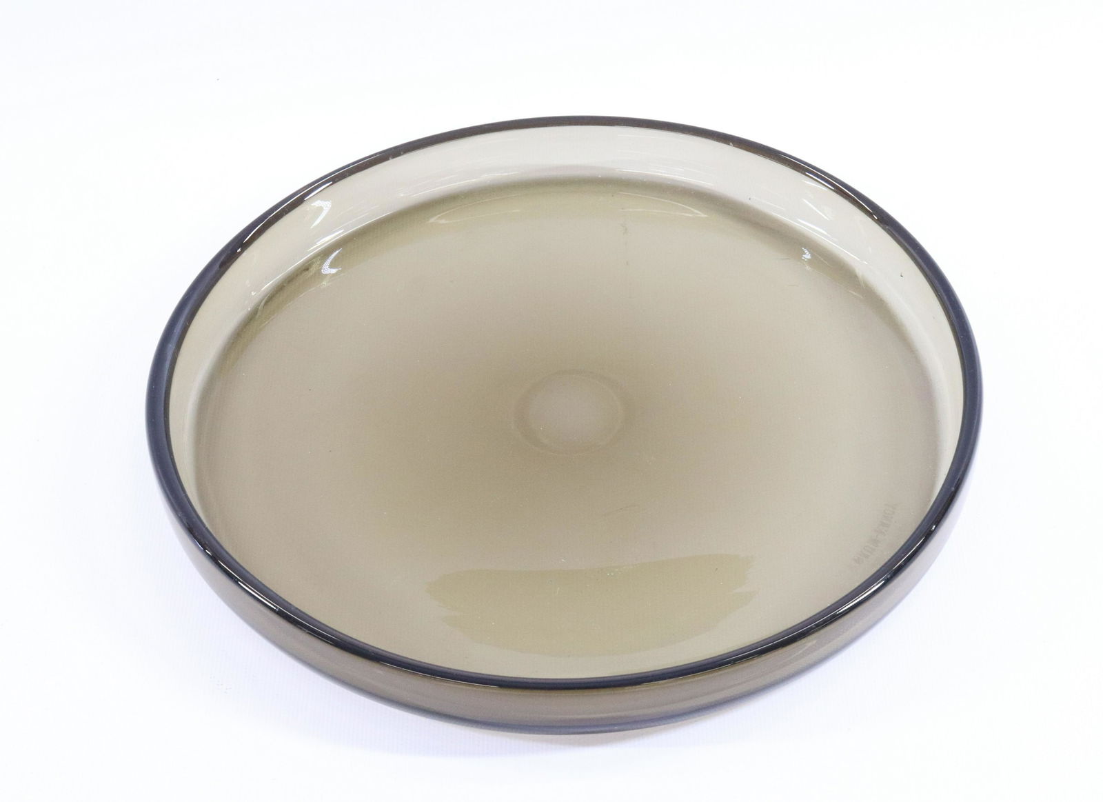 DAUM NANCY ROUND TRAY: AMBER BLOWN GLASS DECANTER TRAY WITH PONTIL BLOCK SIGNATURE ON BASE DIMENSIONS: 10" dia TERMS: Hartzell's Auction Gallery will handle most of the shipping in-house. WE do reserve the right to not ship