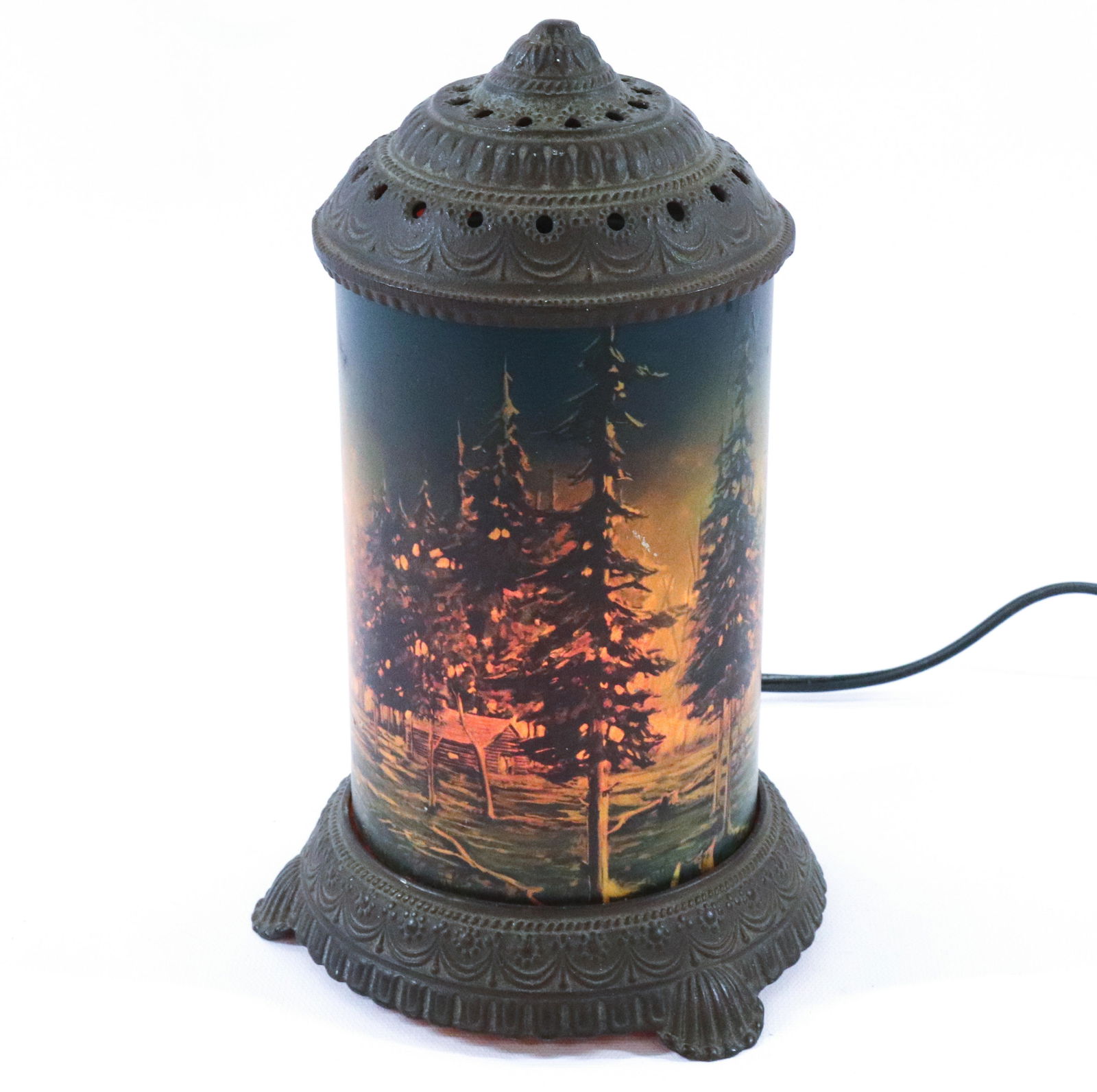 EARLY MOTION LAMP: FOREST FIRE SCENE WITH CAST IRON TOP AND BOTTOM GLASS CYLINDER AND MOTION CYLINDER DIMENSIONS: 9"h x 5" TERMS: Hartzell's Auction Gallery will handle most of the shipping in-house. WE do reserve the r