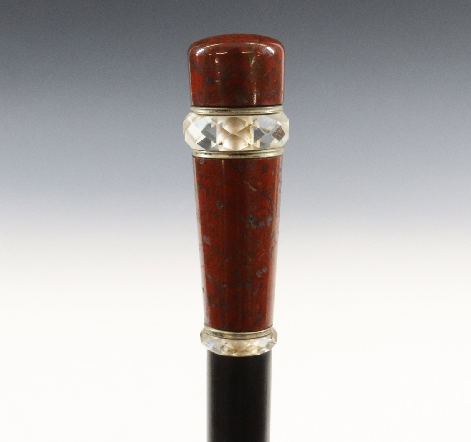 ANTIQUE FRENCH ART DECO CANE: CLOISONNE TOP WITH TWO BANDS OF FACETED CUT CRYSTAL. BLACK EBONY SHAFT WITH METAL FERRULE DIMENSIONS: 38 1/2" L TERMS: Hartzell's Auction Gallery will handle most of the shipping in-house. WE do reser