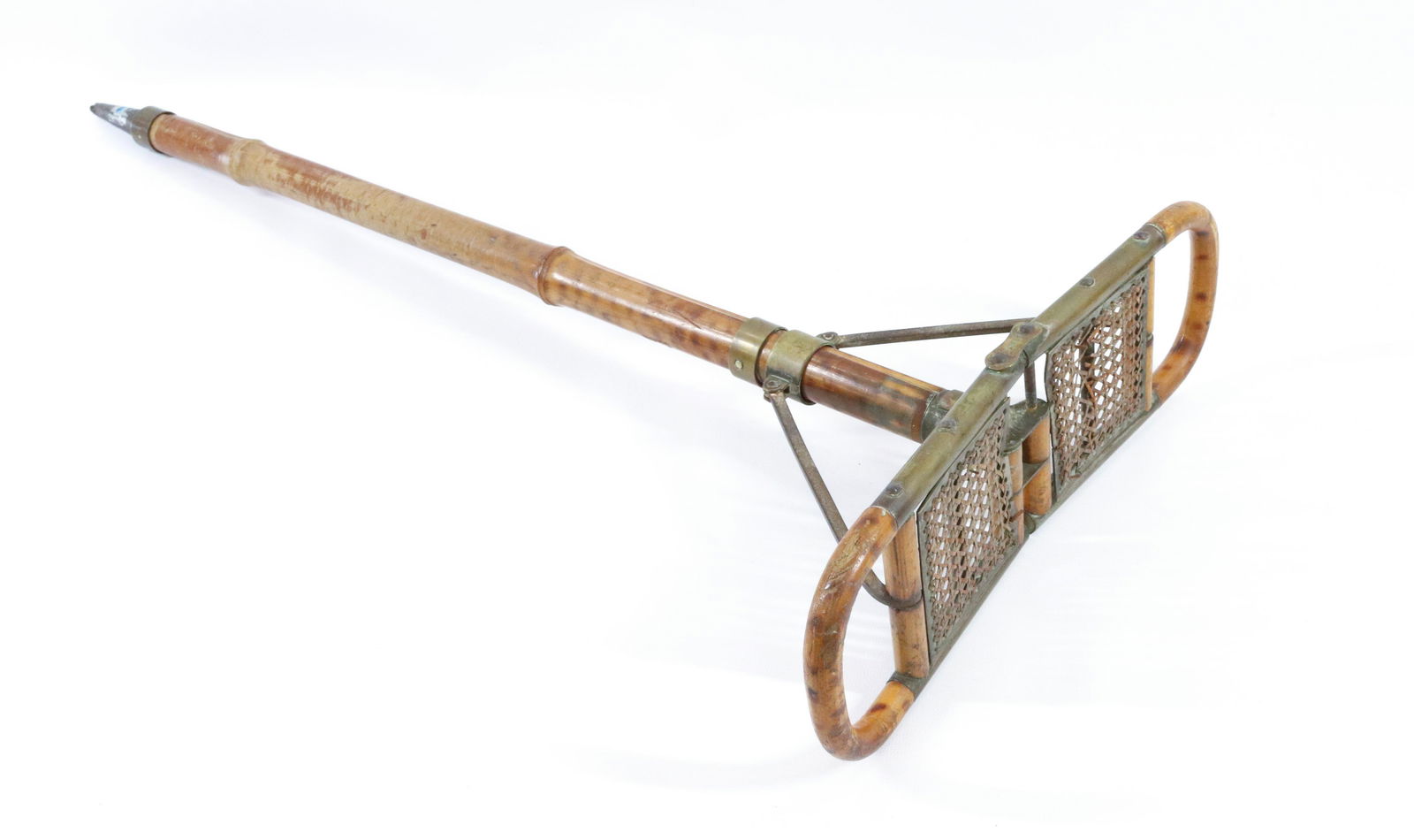 ANTIQUE FRENCH SEAT CANE: FINE BAMBOO GADGET CANE WITH CANED FOLD-UP SEAT. METAL LINKS MRKD. BVT. AND S.G.D.G. SHAFT IS THICK ROUND BAMBOO. FRENCH CA. 1910. FROM THE ESTATE OF FREDERICK COFFAY YOHN (1875-1933) AMERICAN ILLUSTR
