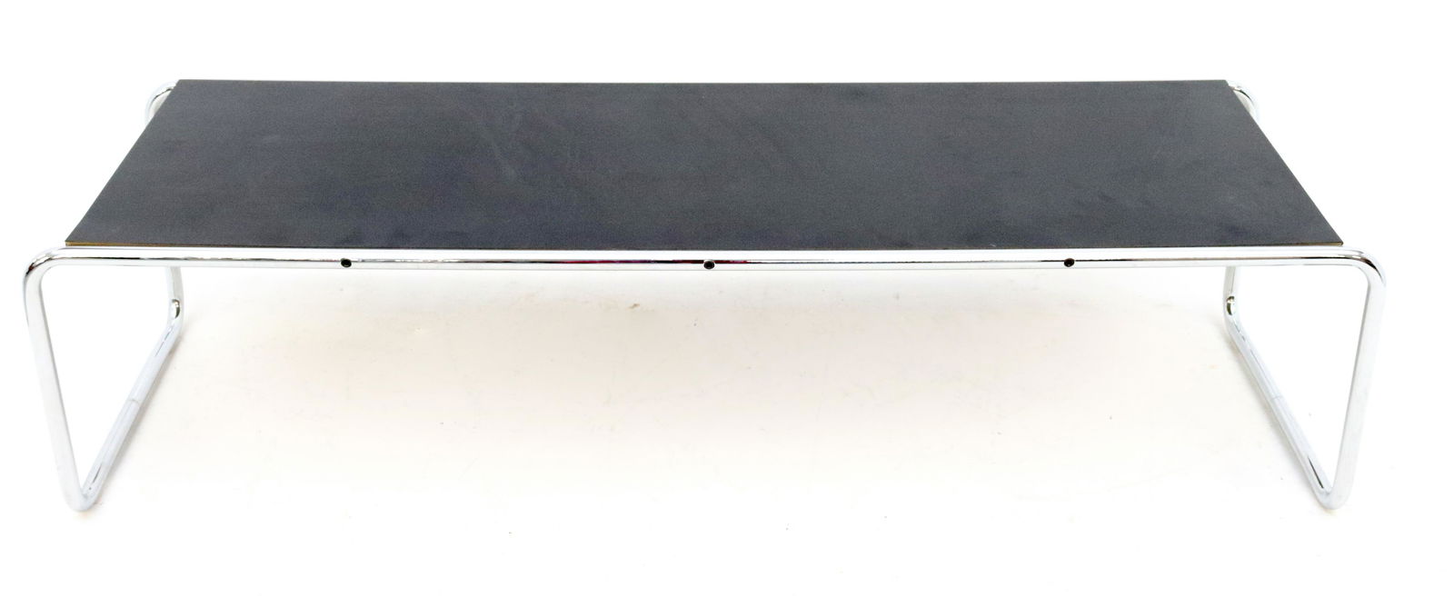 KNOLL STUDIO MARCEL BREUER LACCIO COFFEE TABLE: TUBULAR STEEL FRAME WITH BLACK TOP. LABELED "KNOLLSTUDIO, E99B, 1476" METAL FRAME IS MRKD. KNOLL STUDIO MARCEL BREUER ALSO. DIMENSIONS: 13 1/2" X 54" X 18 1/2" TERMS: Hartzell's Auction Gallery will h