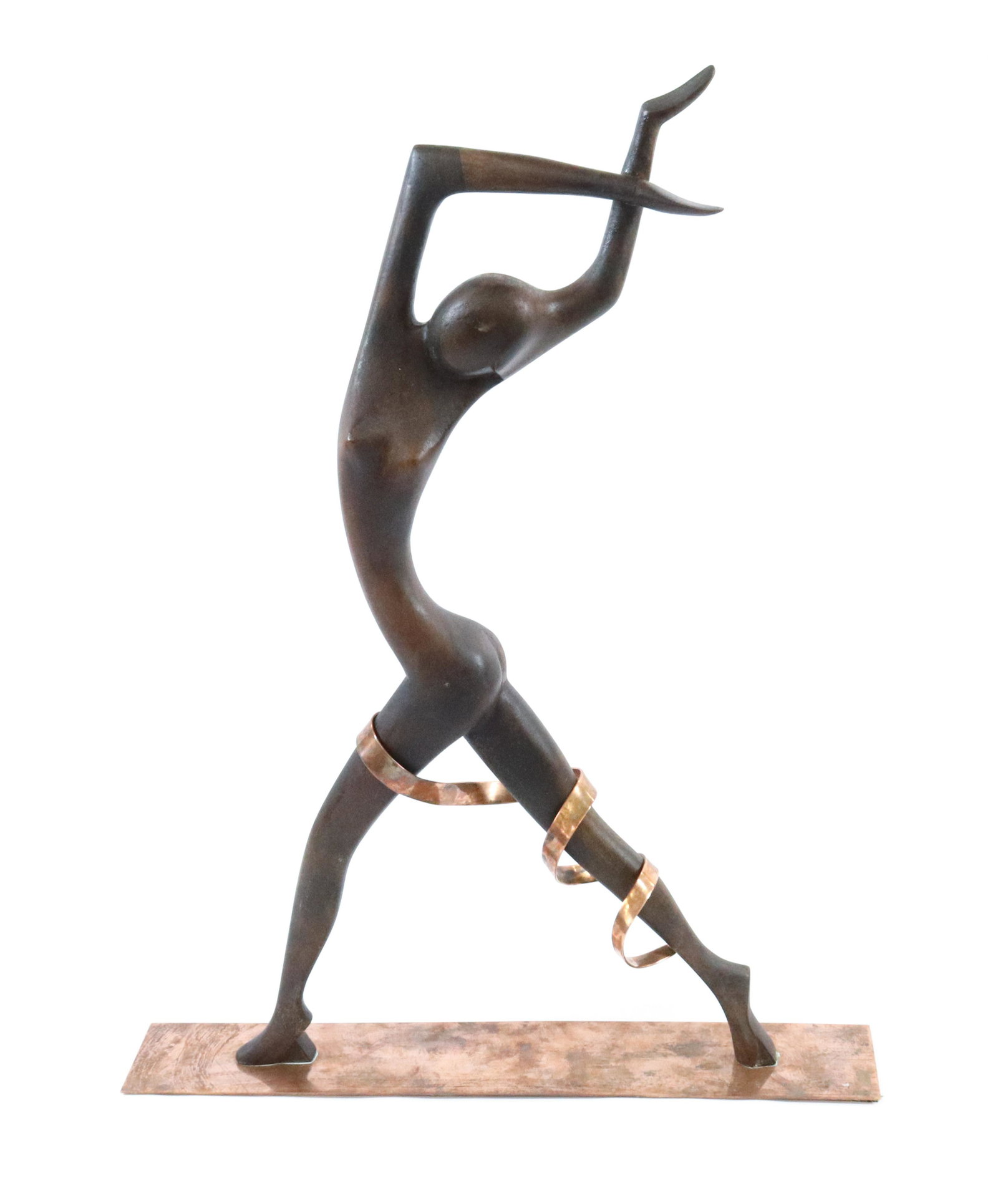 HAGENAUER CARVED WOMAN WITH COPPER RIBBON SCULPTURE: DANCER MIXED MEDIA SCULPTURE OF WOOD AND COPPER. STAMPED ON BOTTOM OF BASE "HAGENAUER, WIEN, MADE IN AUSTRIA WITH CENTER STAMP DIMENSIONS: 22" H X 17" BASE TERMS: Hartzell's Auction Gallery will handl