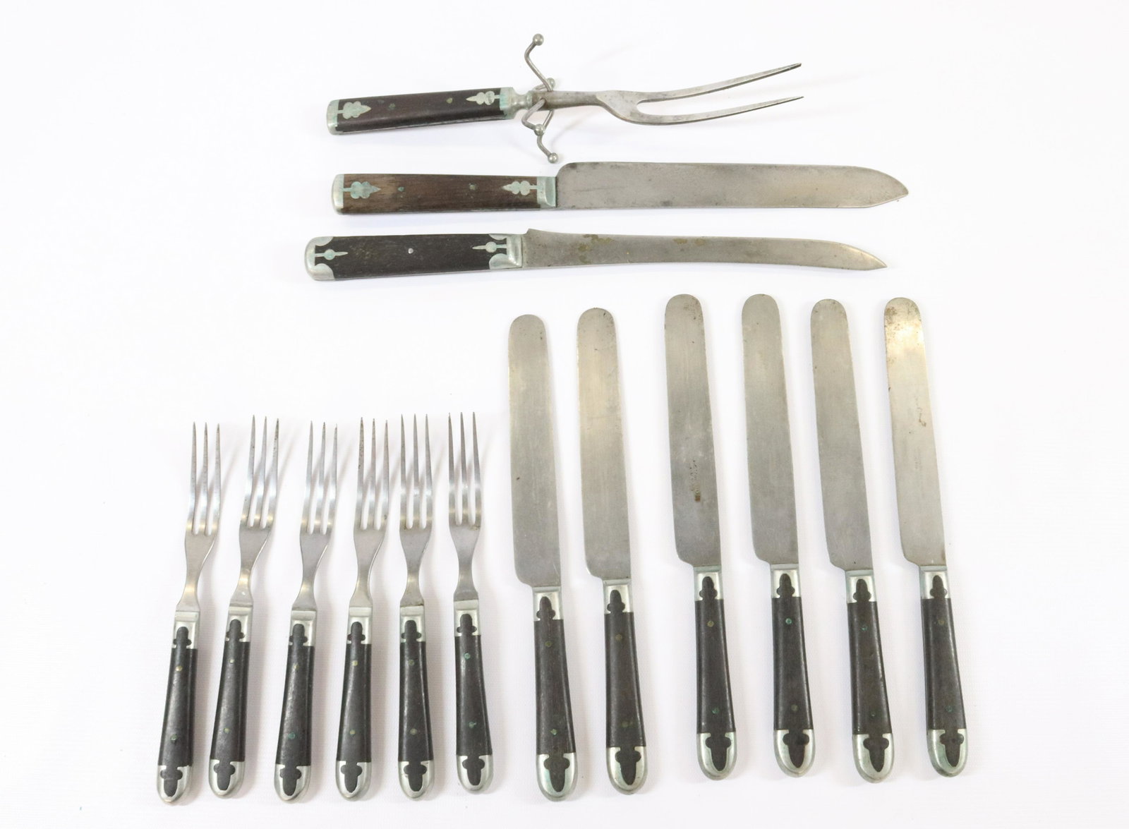 19TH C. WOODEN HANDLE CUTLERY: (15) PIECES INCLUDING THREE PRONG FORKS. ACORN TYPE PATTERN. BLADES MRKD. LANDERS, PRARY & CLARK Size: LONGEST 12 3/4" Terms: Hartzell's Auction Gallery will handle most of the shipping in-house. WE d