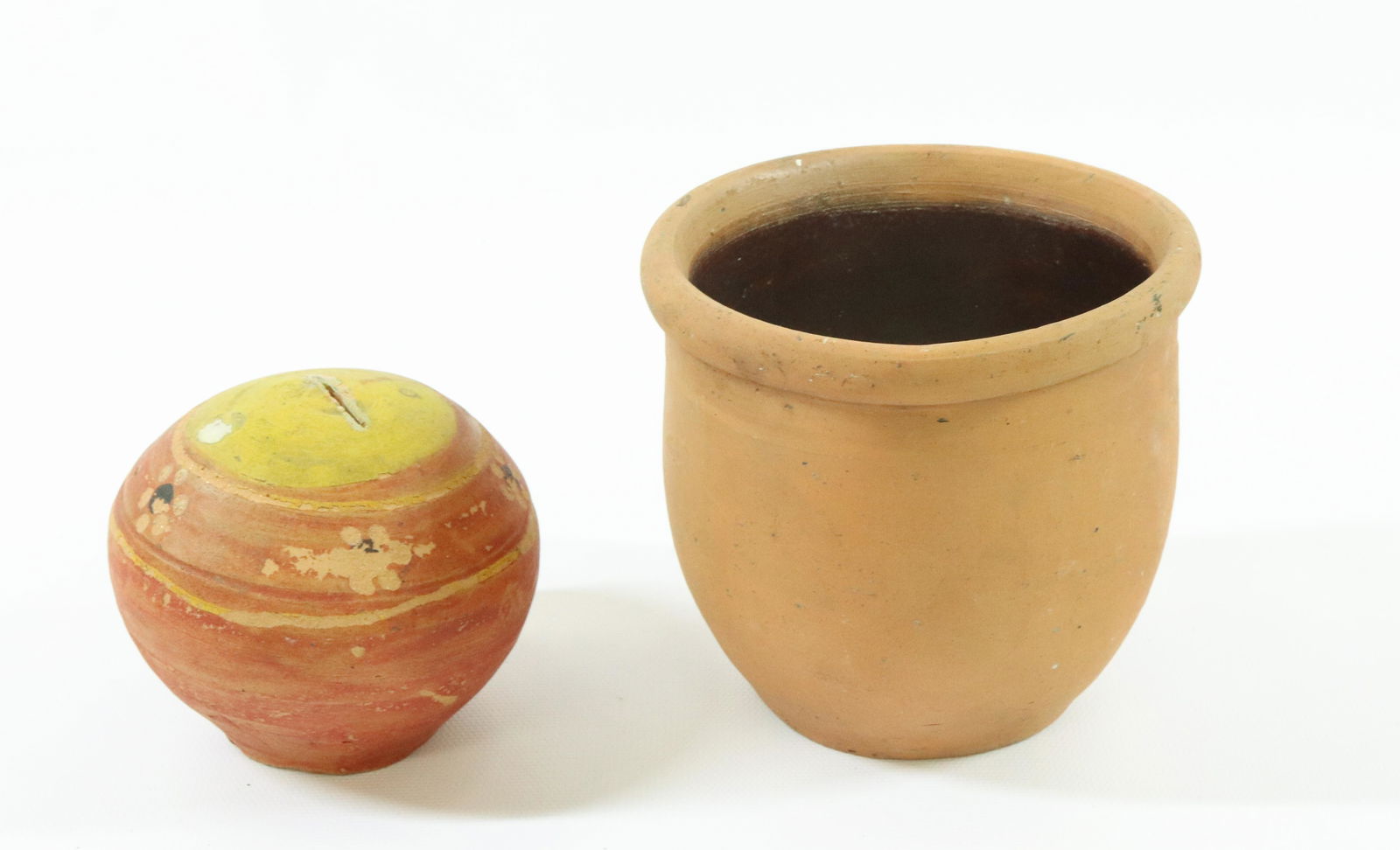 DECORATED POTTERY BANK AND REDWARE CROCK (1 of 3)