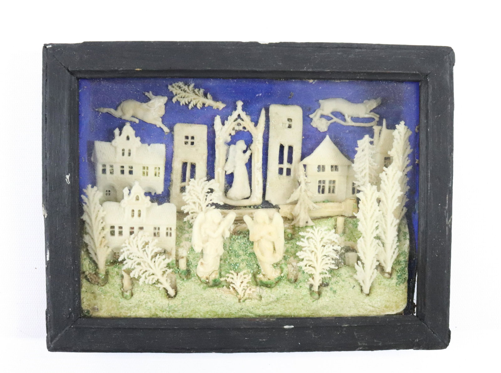 19TH CENTURY WAX RELIGIOUS DIORAMA: WAX SCENE DIORAMA WITH ANGELS, BUILDINGS, ANIMALS, AND TREES - HANDMADE Size: 8 1/2" X 6 1/4" Terms: Hartzell's Auction Gallery will handle most of the shipping in-house. WE do reserve the right to no
