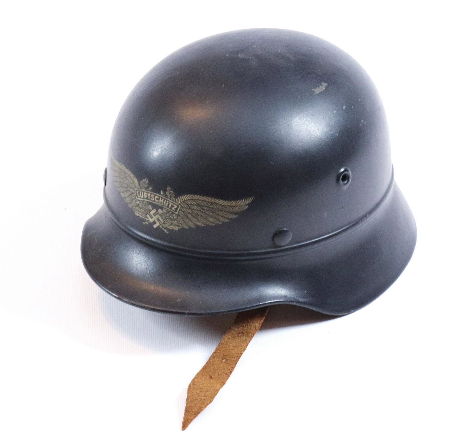 GERMAN MILITARY HELMET: LUFTSCHUTZ WITH EAGLE WINGS - MARKED #857 ON INTERIOR - WITH LINER Size: 7 3/4" INTERIOR MEASUREMENT Terms: Hartzell’s Auction Gallery will handle all Background Checks On-Site. Sunday April 3rd