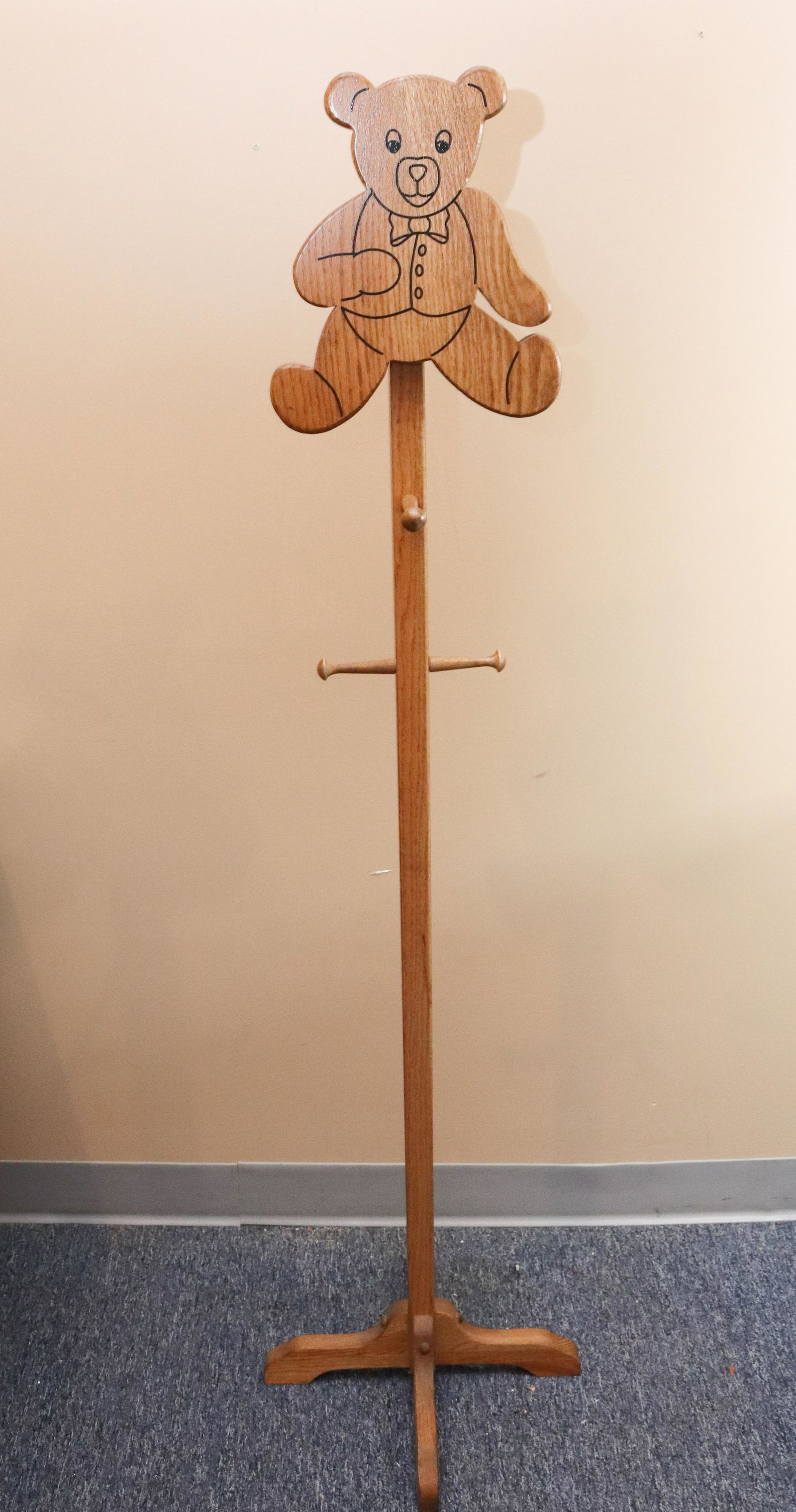 CHILDS WOODEN CLOTHES TREE: TEDDY BEAR MOTIF Size: 58" H Terms: This is an On-Site Auction. Pick-up will be from Monday April 4th – Thursday April 7th from 9:00am till 4:00pm OR BY APPOINTMENT. All Items must be paid for b