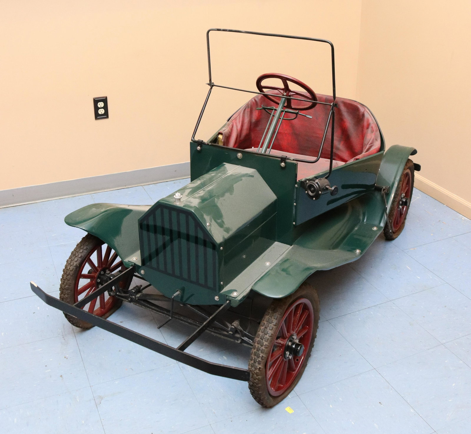 VINTAGE REPLICA TIN LIZZY MOTOR DRIVEN CAR: BRIGGS & STRATTON 1.5 HORSEPOWER GASOLINE ENGINE Size: 36" X 74" X 36" Terms: This is an On-Site Auction. Pick-up will be from Monday April 4th – Thursday April 7th from 9:00am till 4:00pm OR BY