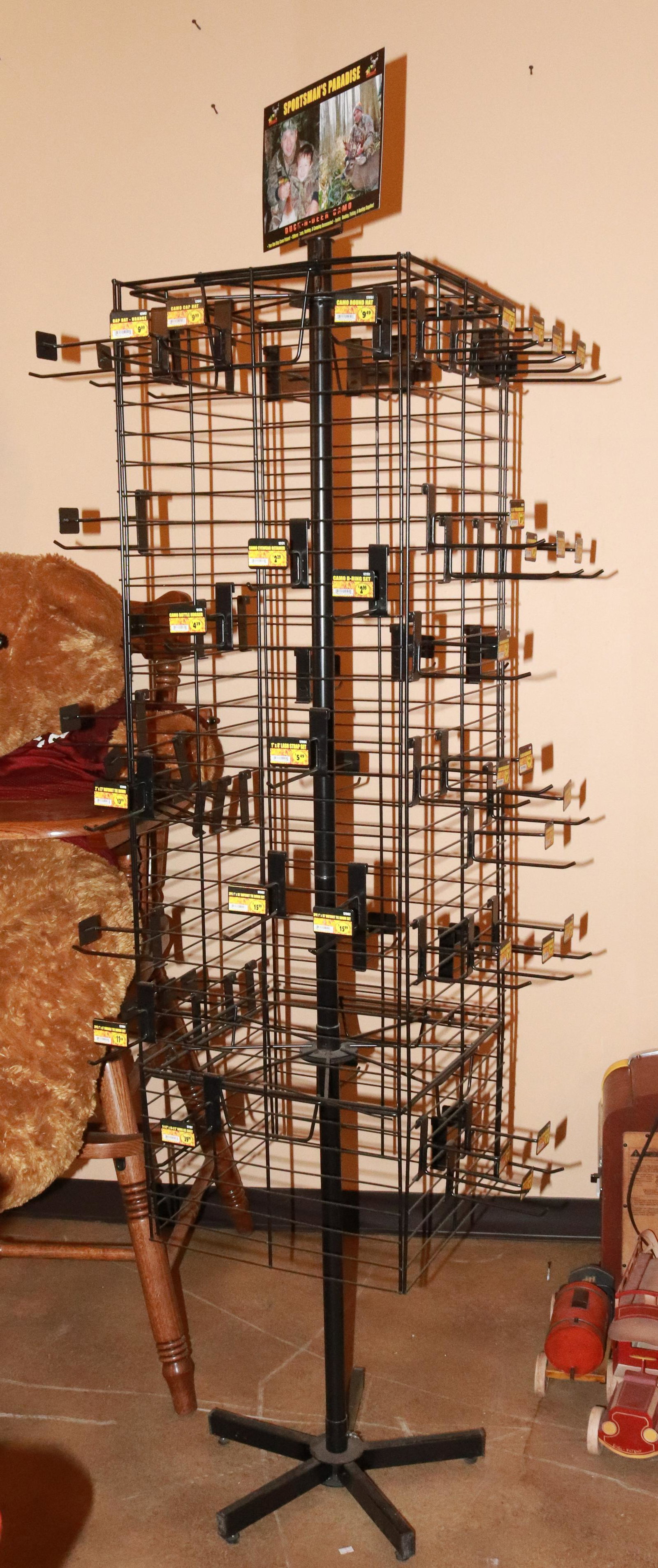 METAL STORE DISPLAY RACK: ADJUSTABLE METAL PEGS SIZE: 76" H TERMS: This is an On-Site Auction. Pick-up will be from Monday April 4th – Thursday April 7th from 9:00am till 4:00pm OR BY APPOINTMENT. All Items must be paid 