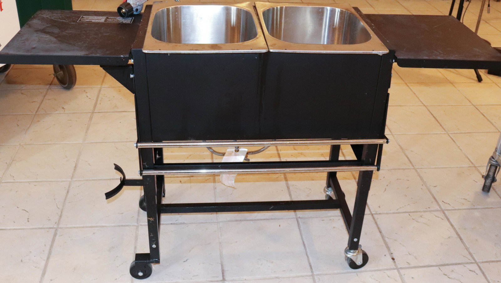 METAL FOOD WARMING CART: TWO STAINLESS STEEL INSERTS. PROPANE HEATED SIZE: 32" X 54" X 17" TERMS: This is an On-Site Auction. Pick-up will be from Monday April 4th – Thursday April 7th from 9:00am till 4:00pm OR BY APPO