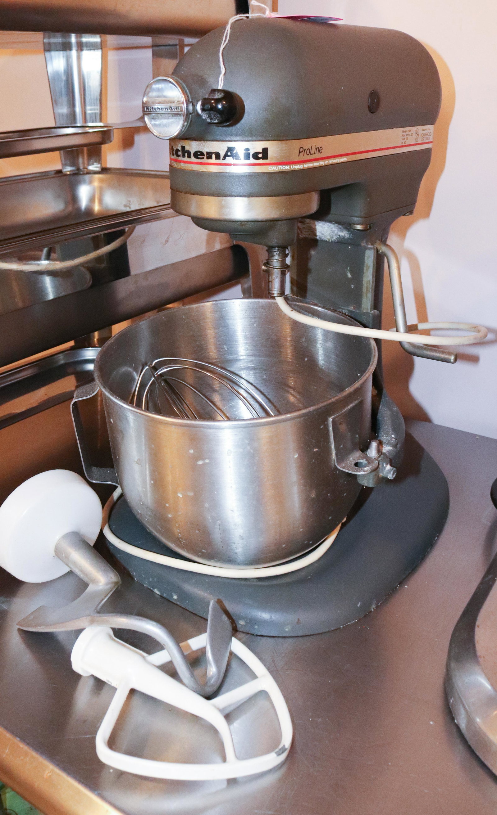 KITCHEN AID PRO LINE MIXER: MODEL KSM5 WITH ATTACHMENTS TERMS: This is an On-Site Auction. Pick-up will be from Monday April 4th – Thursday April 7th from 9:00am till 4:00pm OR BY APPOINTMENT. All Items must be paid for be
