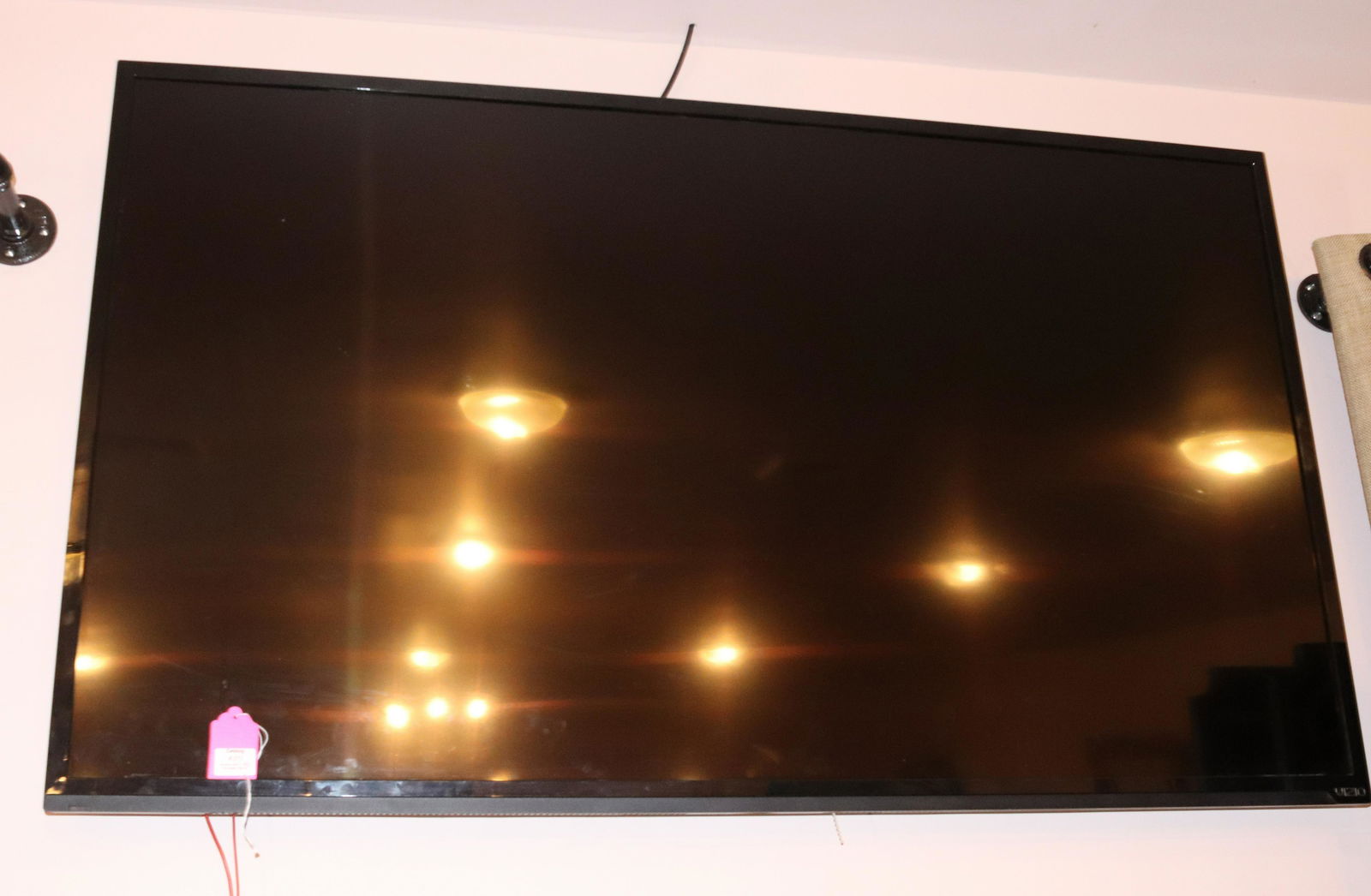 VIZIO FLAT SCREEN TV: WITH REMOTE SIZE: 52" L TERMS: This is an On-Site Auction. Pick-up will be from Monday April 4th – Thursday April 7th from 9:00am till 4:00pm OR BY APPOINTMENT. All Items must be paid for before