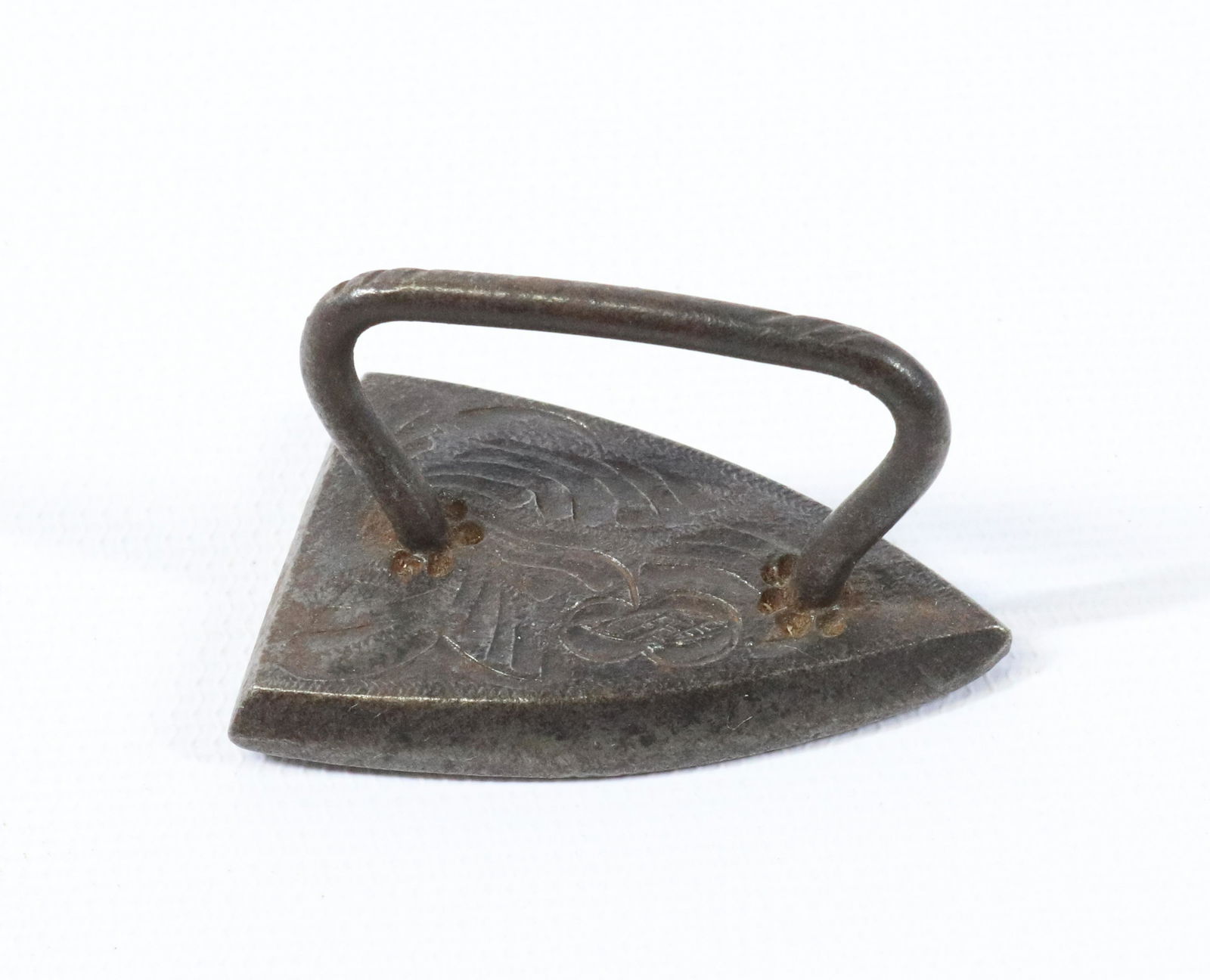 Engraved Amazock Iron: Vine Decorated Top SIZE: 1 3/4"