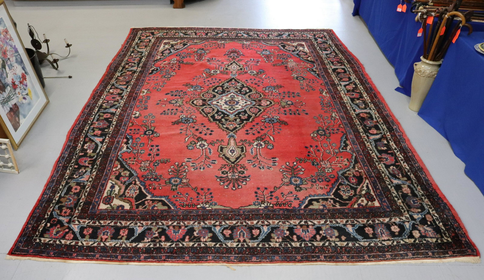 ORIENTAL CARPET: PLUSH CARPET IN RED, BLUE, AND CREAM DIMENSIONS: 12' X 9' TERMS: Hartzell's Auction Gallery will handle most of the shipping in-house. WE do reserve the right to not ship some large items, larger lots