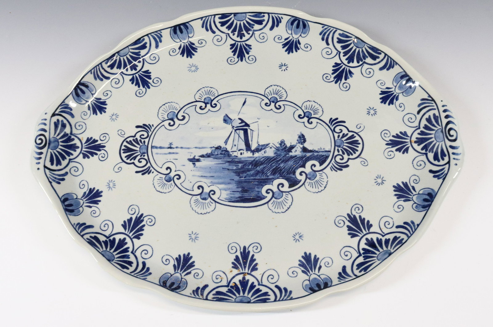 ERVEN LUCAS BOLS DELFT PLATTER: MRKD. ON BOTTOM. 7/62 R SIZE: 12 1/2" X 16 1/2" TERMS: Please Read Carefully. Pick-Up will be 1 WEEK ONLY. June 20th through June 24th. Hartzell’s Auction Gallery will Handle All Shipping In-Hou