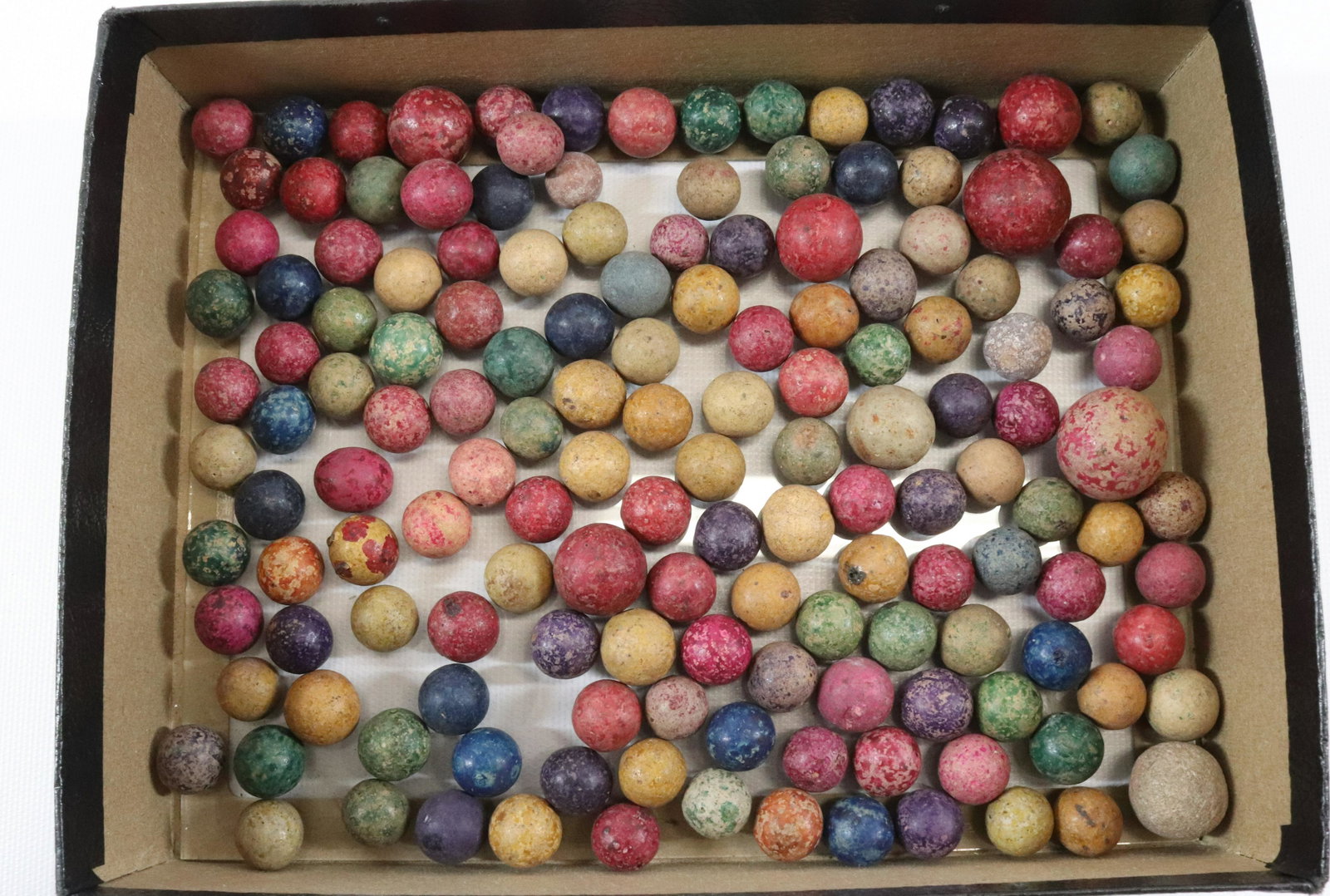 LOT OF CLAY MARBLES: VARIOUS SIZES AND COLORS SIZE: TERMS: Please Read Carefully. Pick-Up will be 1 WEEK ONLY. June 20th through June 24th. Hartzell’s Auction Gallery will Handle All Shipping In-House. Please call 6