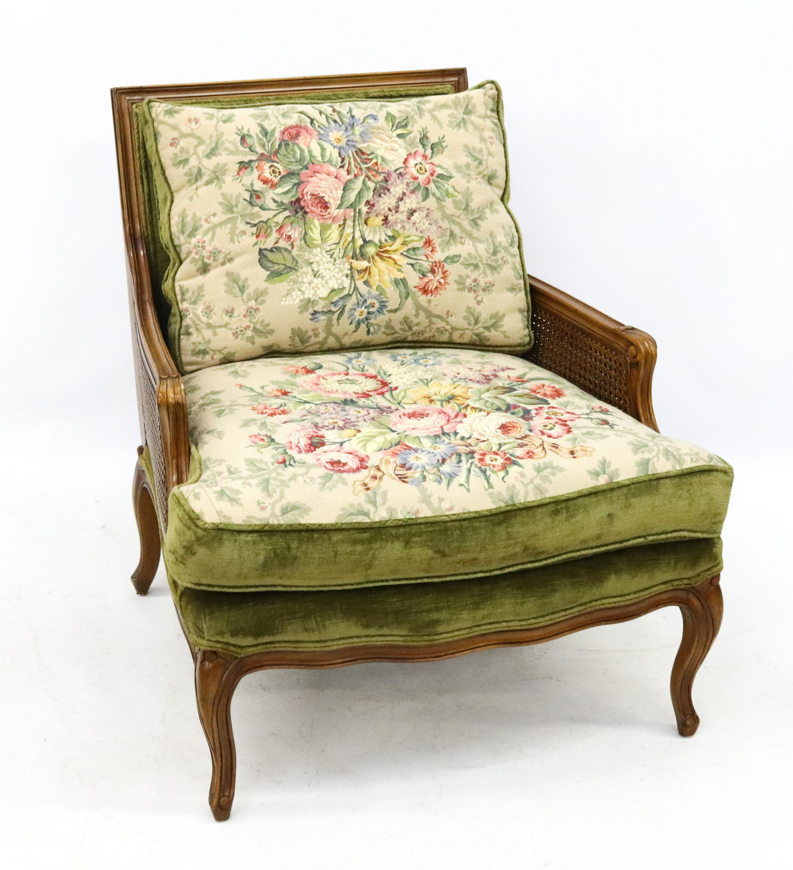 UPHOLSTERED LOUNGING CHAIR: NEEDLEPOINT FLORAL CUSHIONS WITH WOOD FRAME AND CANED SIDE PANELS SIZE: 31" X 28" X 28" TERMS: Please Read Carefully. Pick-Up will be 1 WEEK ONLY. June 20th through June 24th. Hartzell’s Auction