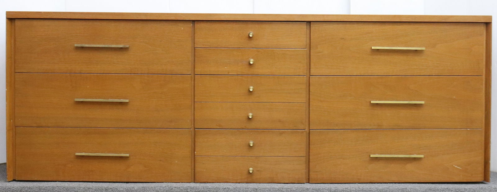 MID CENTURY DRESSER: JOHN STUART, NINE DRAWERS NO LEGS SIZE: TERMS: Please Read Carefully. Pick-Up will be 1 WEEK ONLY. June 20th through June 24th. Hartzell’s Auction Gallery will Handle All Shipping In-House. Plea