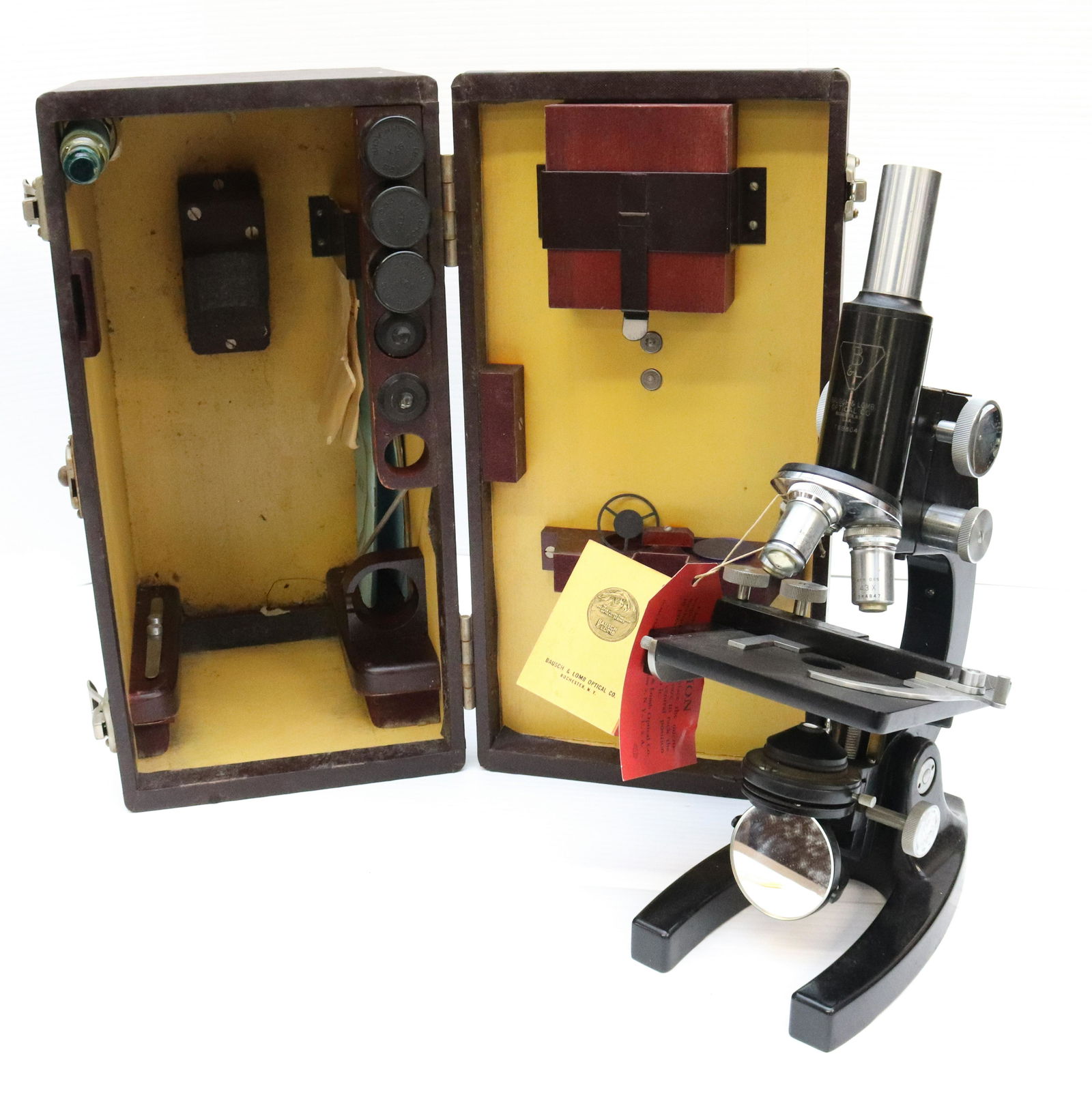 BAUSCH AND LOMB OPTICAL MICROSCOPE AND CASE (1 of 5)