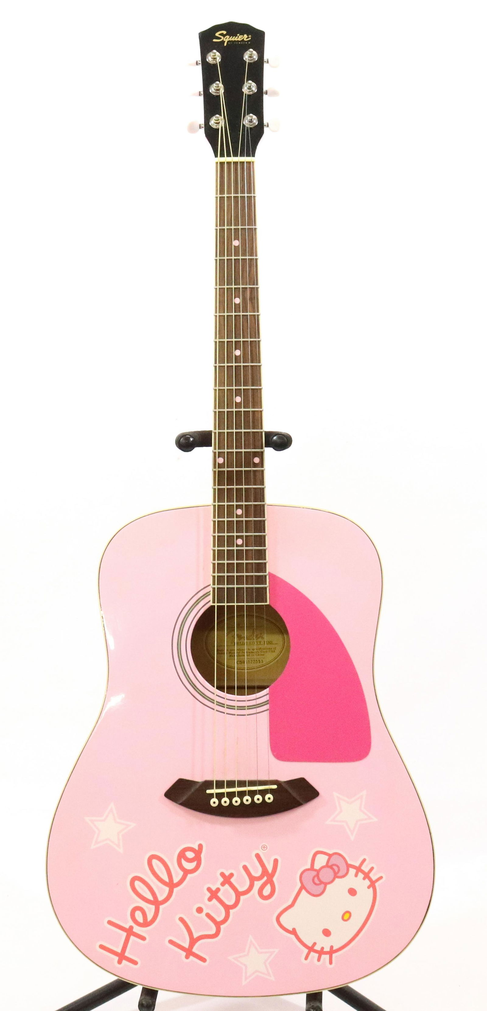 FENDER SQUIRE ACOUSTIC GUITAR: FENDER SQUIRE ACOUSTIC GUITAR HELLO KITTY PINK SIZE: 41" X 16" X 4.5" TERMS: Please Read Carefully. Pick-Up will be 1 WEEK ONLY. June 20th through June 24th. Hartzell’s Auction Gallery will Hand