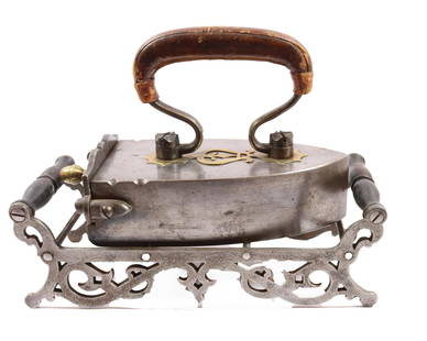 FINE FRENCH 19TH C. BOX IRON: EARLY PIERCED IRON WITH BRASS DECORATION. LEATHER STIR UP HANDLE WITH TRIVET 7 1/2" L