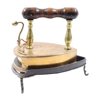 FINE 19TH C. EUROPEAN BOX IRON: BRASS ROUND BACK IRON WITH LIFT-GATE AND ACORN FINIAL. "F.H." IN GARLAND WITH CROWN ENGRAVED ON TOP. WITH CAST IRON TRIVET 7 1/4" L