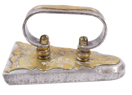 19TH C. EUROPEAN FLAT IRON: ENGRAVED BRASS FLORAL TOP AND BRASS DIAMOND ON STIR-UP HANDLE. ELONGATED STEEL SOLE. 7 1/4" L