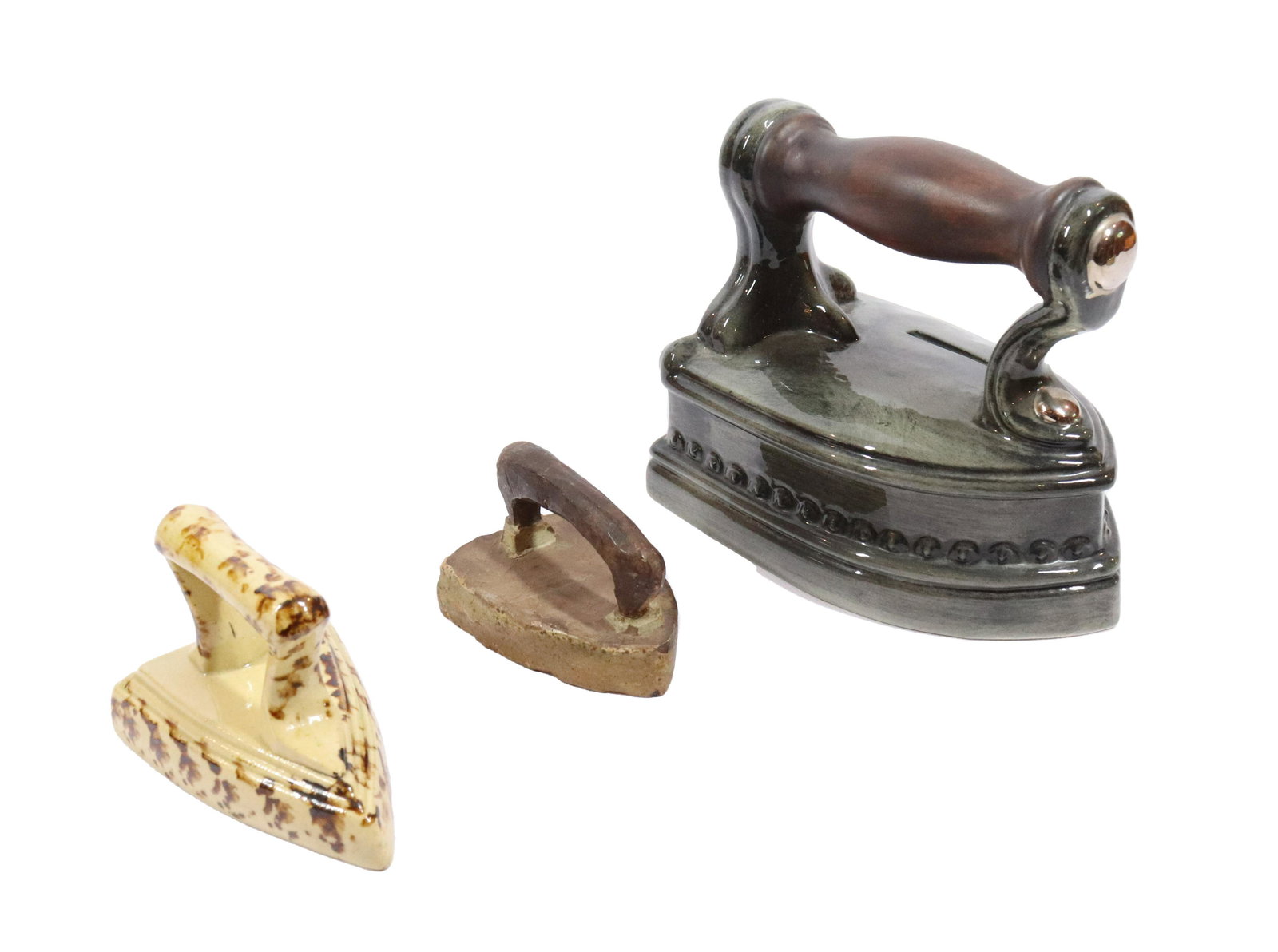 LOT OF THREE POTTERY IRONS (1 of 3)