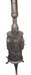 OTTO HOFFMAN REVOLVING STOVE: REVOLVING STOVE WITH SIX DOORS FOR TAILOR IRONS. HOROVICE F. WIRK PATENT 57" H