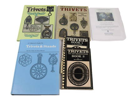 LOT OF TRIVET REFERENCE BOOKS: THE A TO Z GUIDE, "TRIVETS OLD AND REPRODUCTIONS, BOOKS 1 AND 2", "TRIVETS, THE EXPANDED GUIDE", AND "COLLECTORS GUIDE TO TRIVETS AND STANDS"