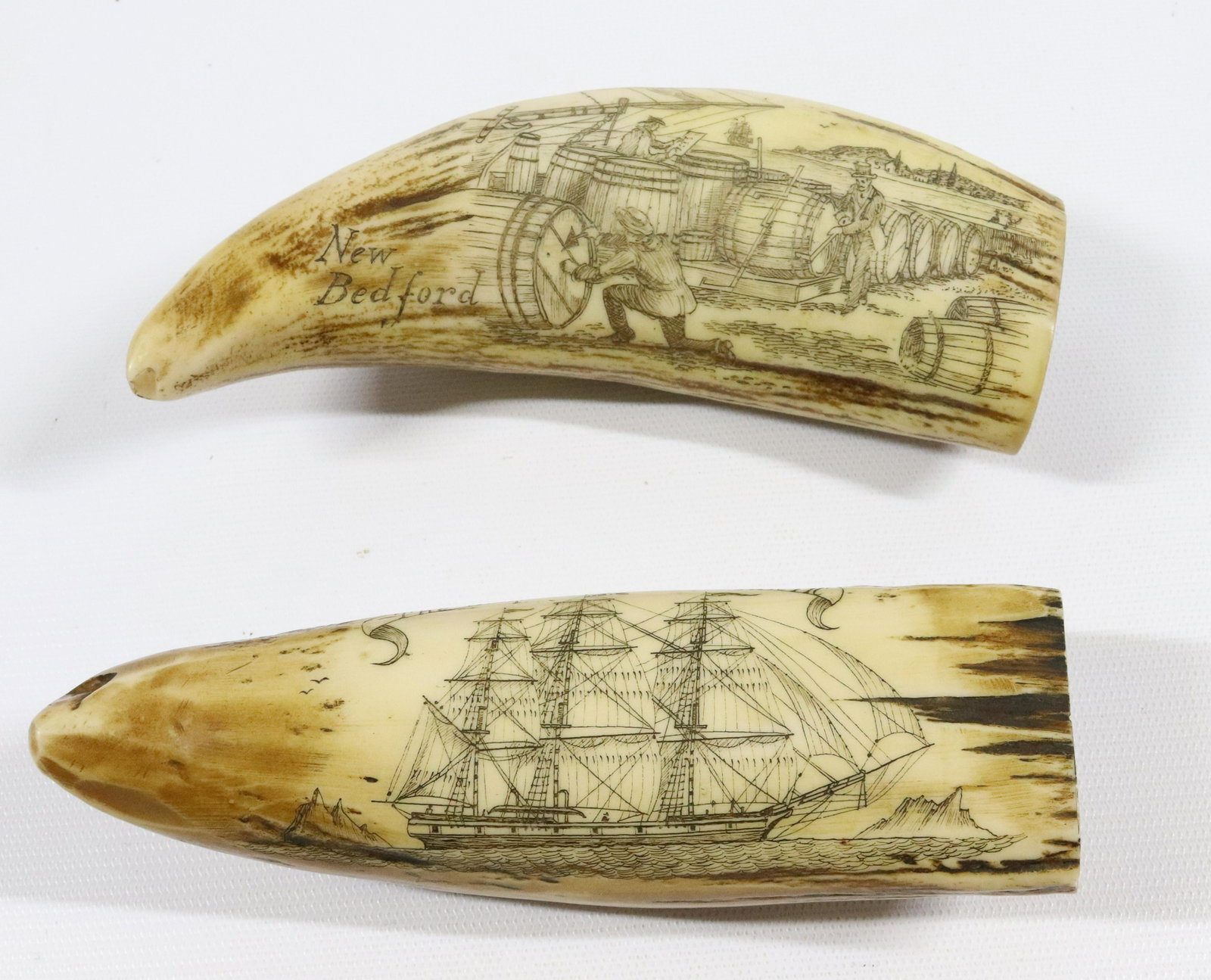 REPLICA SCRIMSHAW WHALE TEETH: ALL OVER DECORATED SURFACES. "WHALING IN THE BERING STRAIT" AND "THE SHIP STARBUCK" Size: 6" L Terms: PLEASE READ THIS CAREFULLY AND FULLY BEFORE BIDDING - THIS IS AN ON-SITE AND LIVE IN PERSON AUCTIO