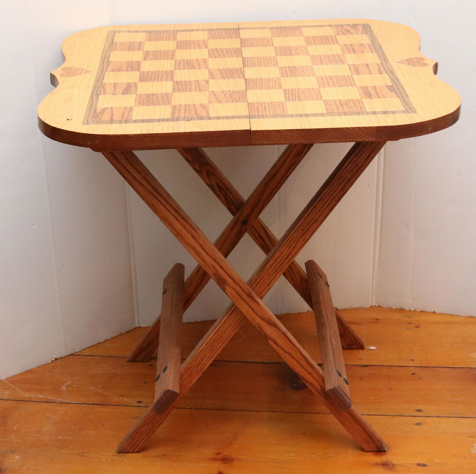 HOLDING CHECKER BOARD (1 of 2)