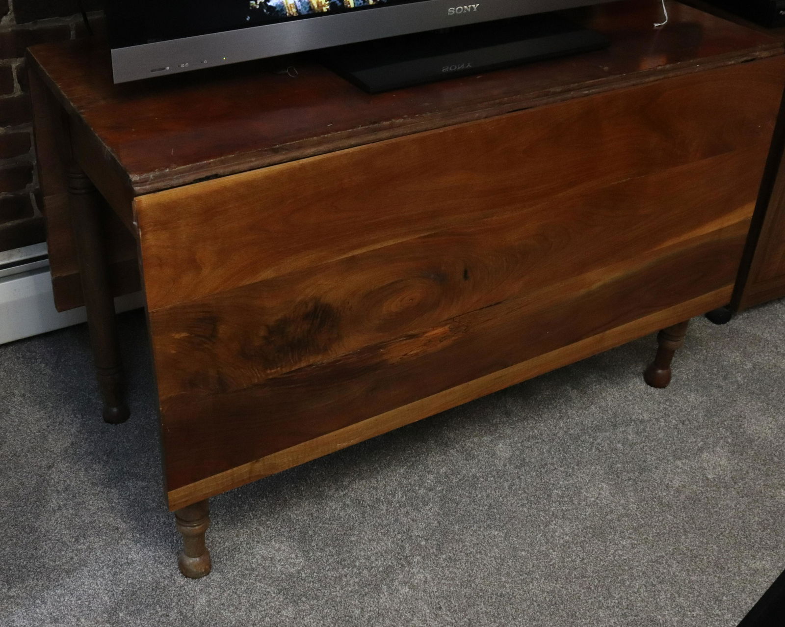 19TH C. DROP-LEAF TABLE: GATELEG STYLE. REFINISHED SURFACE. PICK-UP ONLY IN 18067 Size: 28 1/2" X 45" X 58" Terms: PLEASE READ THIS CAREFULLY AND FULLY BEFORE BIDDING - THIS IS AN ON-SITE AND LIVE IN PERSON AUCTION. PREVIEW W