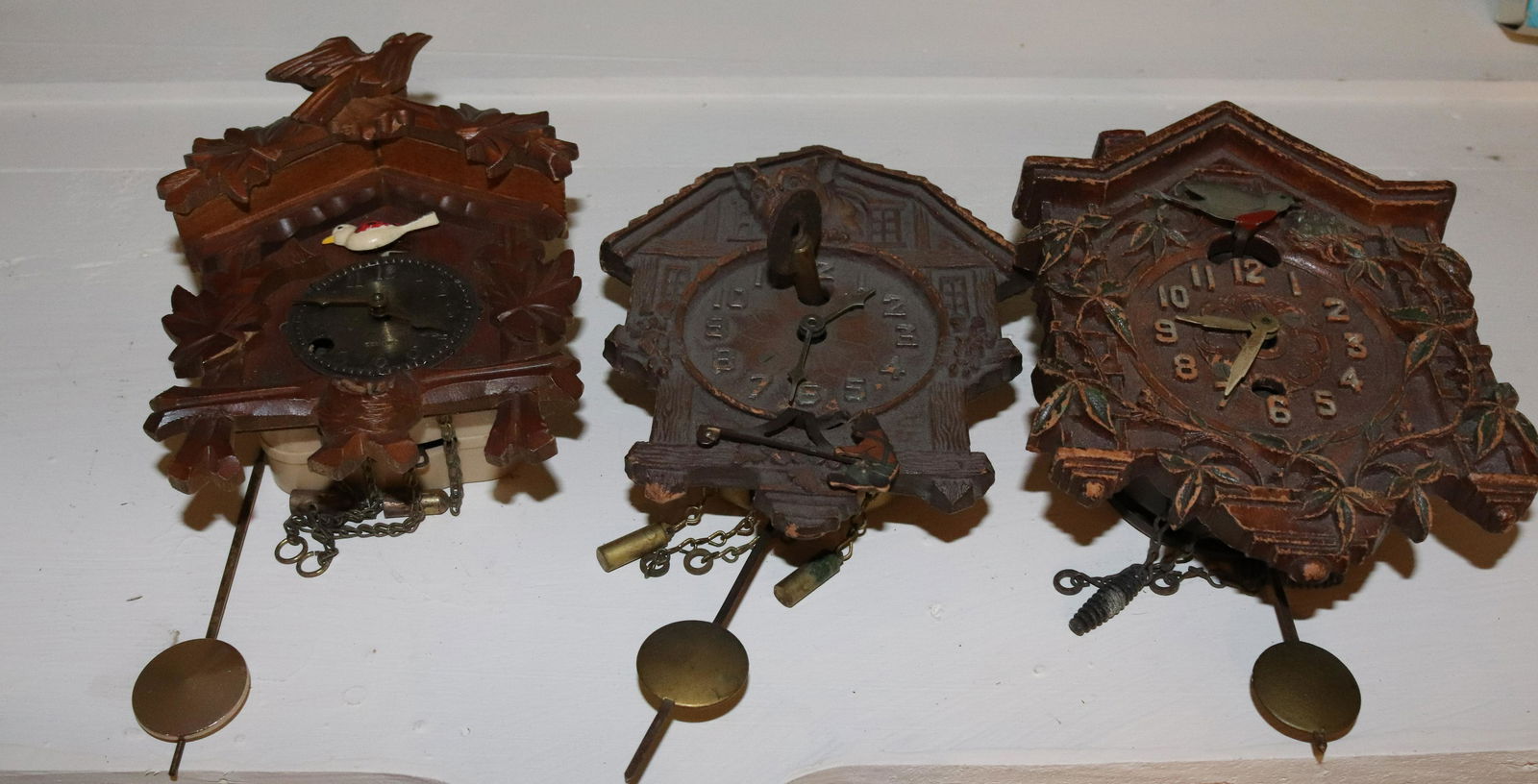 (3) MINIATURE CUCKOO CLOCKS (1 of 3)